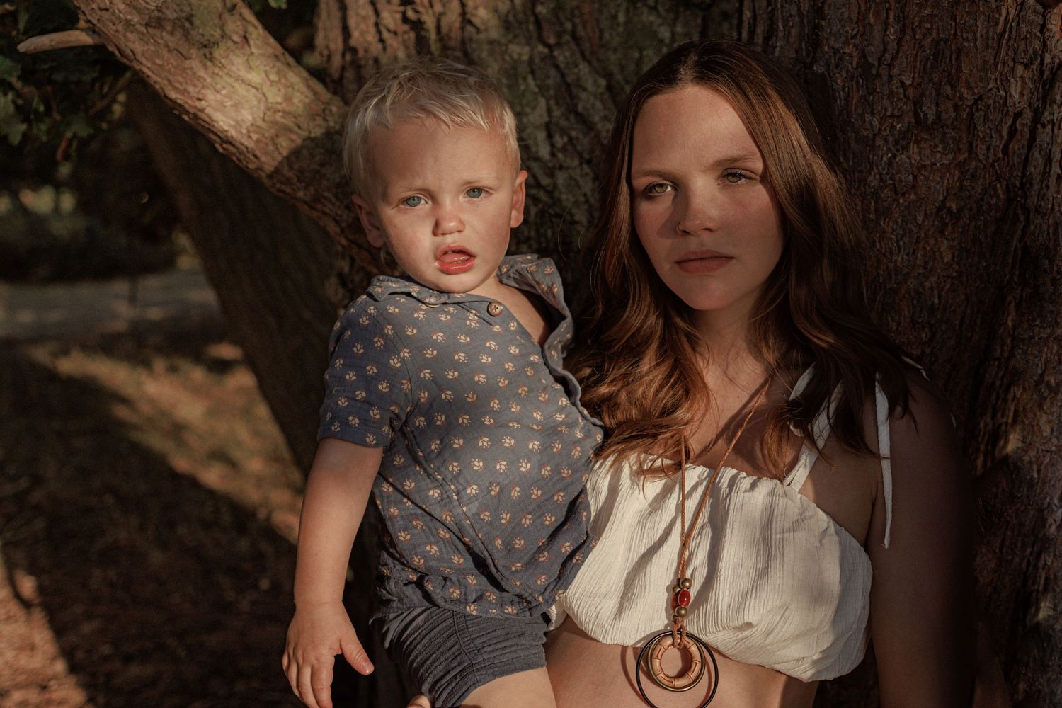 Portrait of mother and son during a maternity photoshoot in Thetford, cinematic vibe