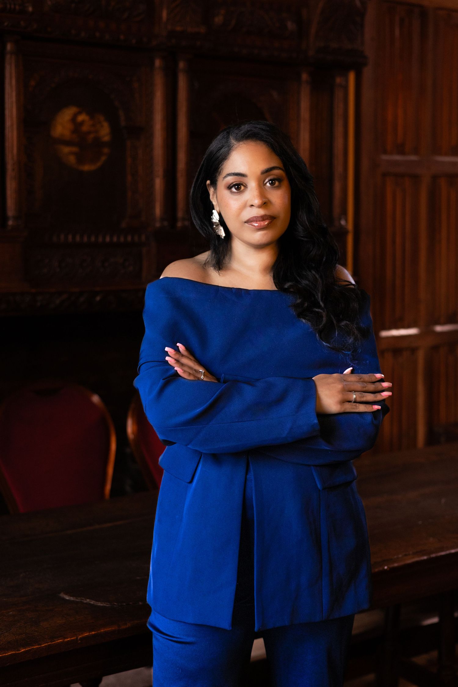 personal branding  at Tudor room in the Christchurch mansion ,Ipswich.bold colours, cultural fusion,woman, standing, arms crossed, confident