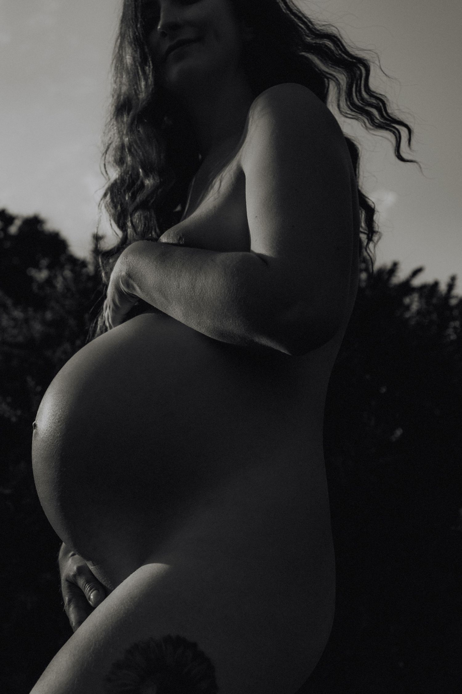 Beautiful portrait from a maternity session in Thetford fields, free, monochrome, captured by the female gaze of untamed muses