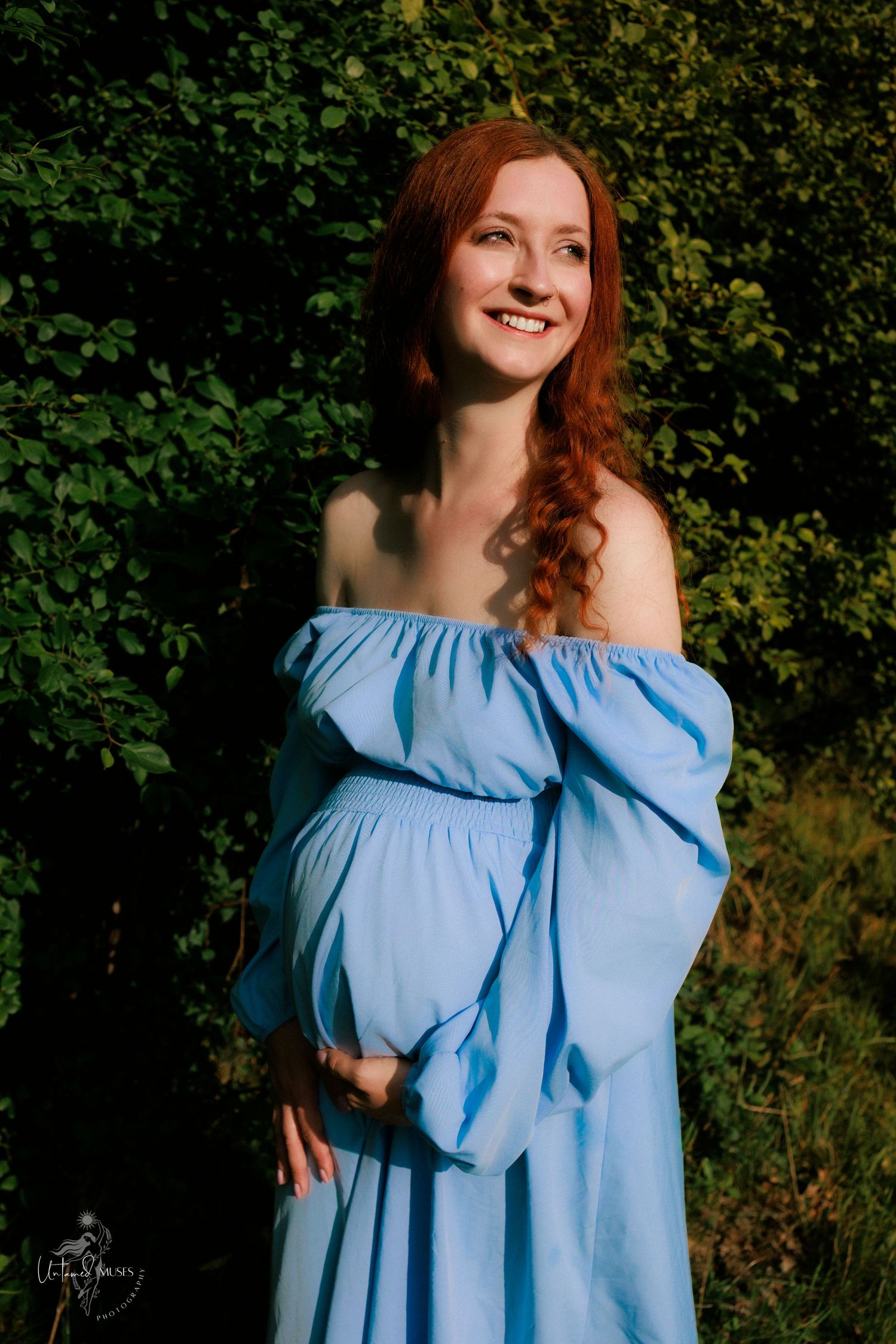 Empowerment boudoir maternity photoshoot, radiant pregnant woman in blue dress, nature, colour, natural light, Thetford, untamed muses