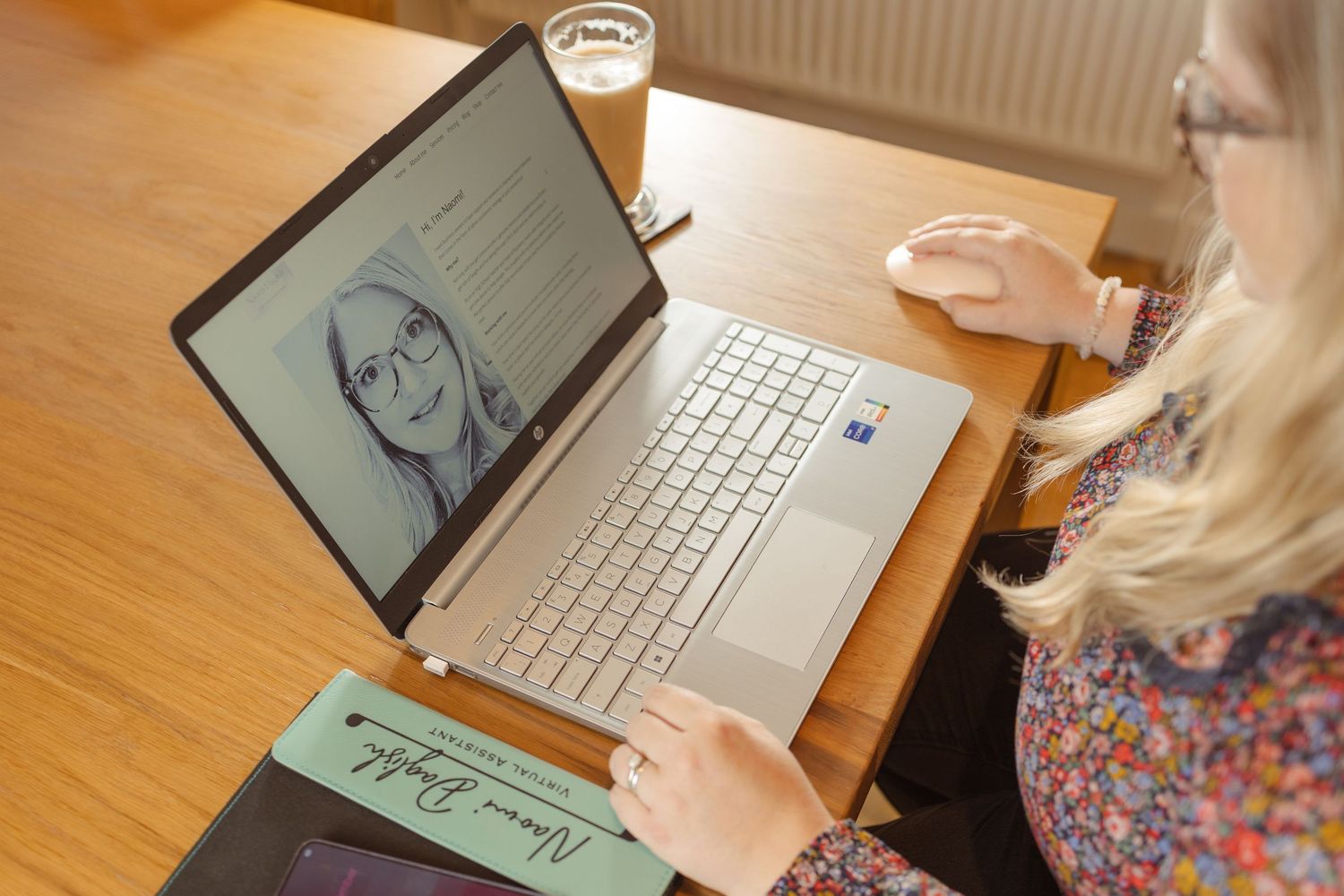 Detail from personal branding photoshoot for Naomi Daglish in Bury st Edmunds , Virtual assistant , laptop and her website on screen