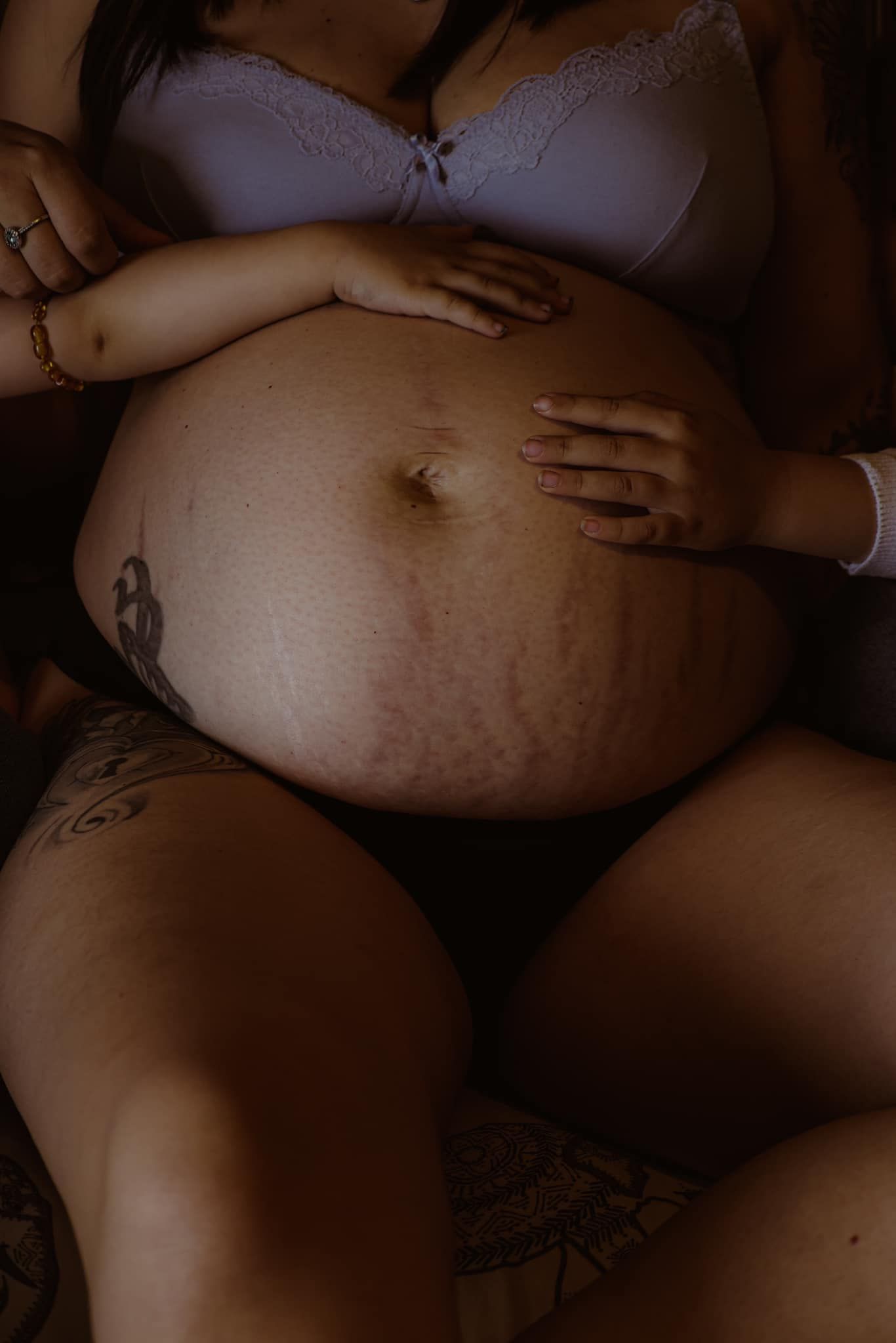 Close up from at home maternity session in documentary style by Empowerment photographer Untamed Muses in Thetford, emotion and rawness
