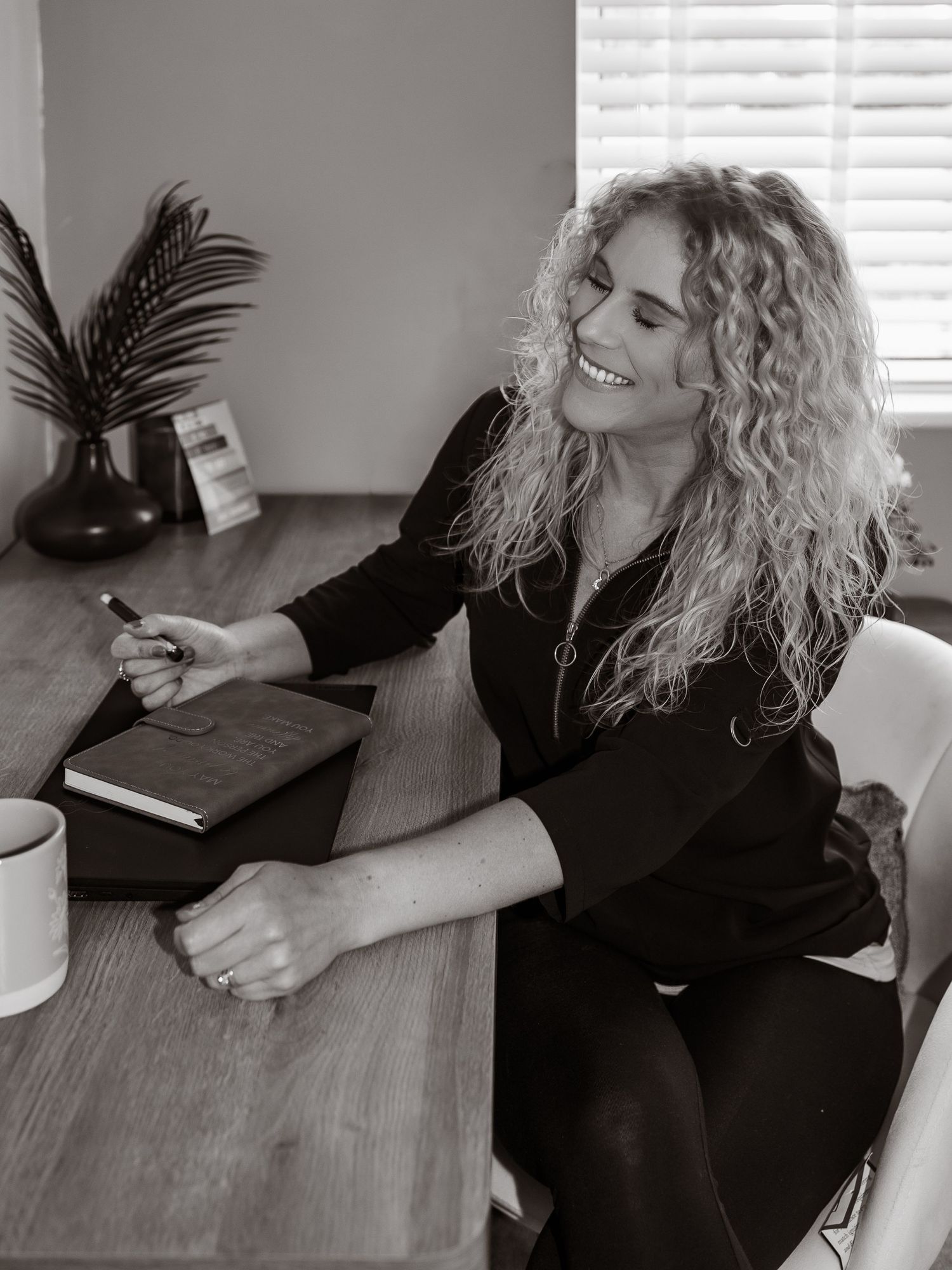 Personal branding portrait of smiling woman at office, confident, relaxed, joyful. by Untamed Muses in Suffolk