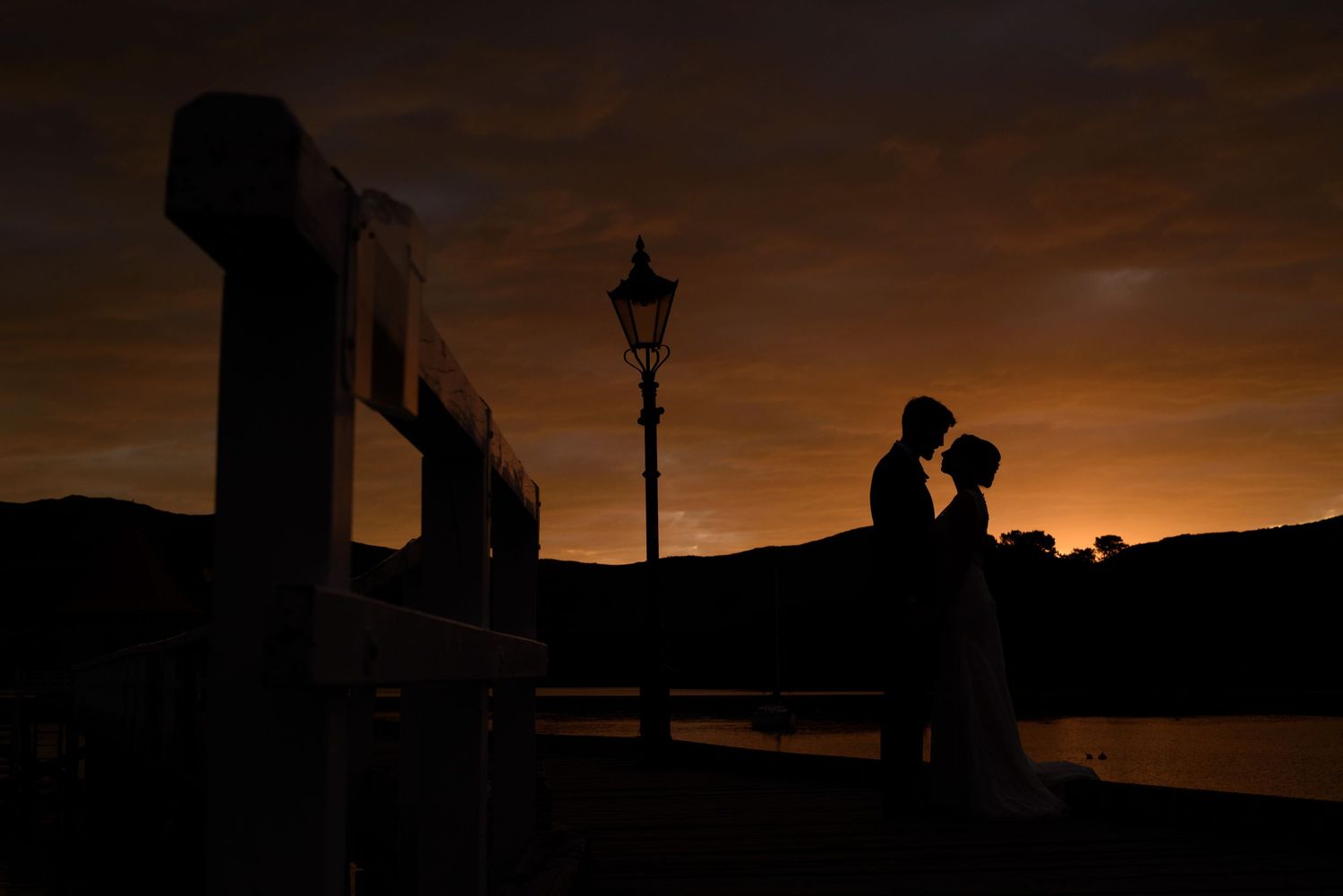 Wedding portrait at sunset in Akaroa, New Zealand.