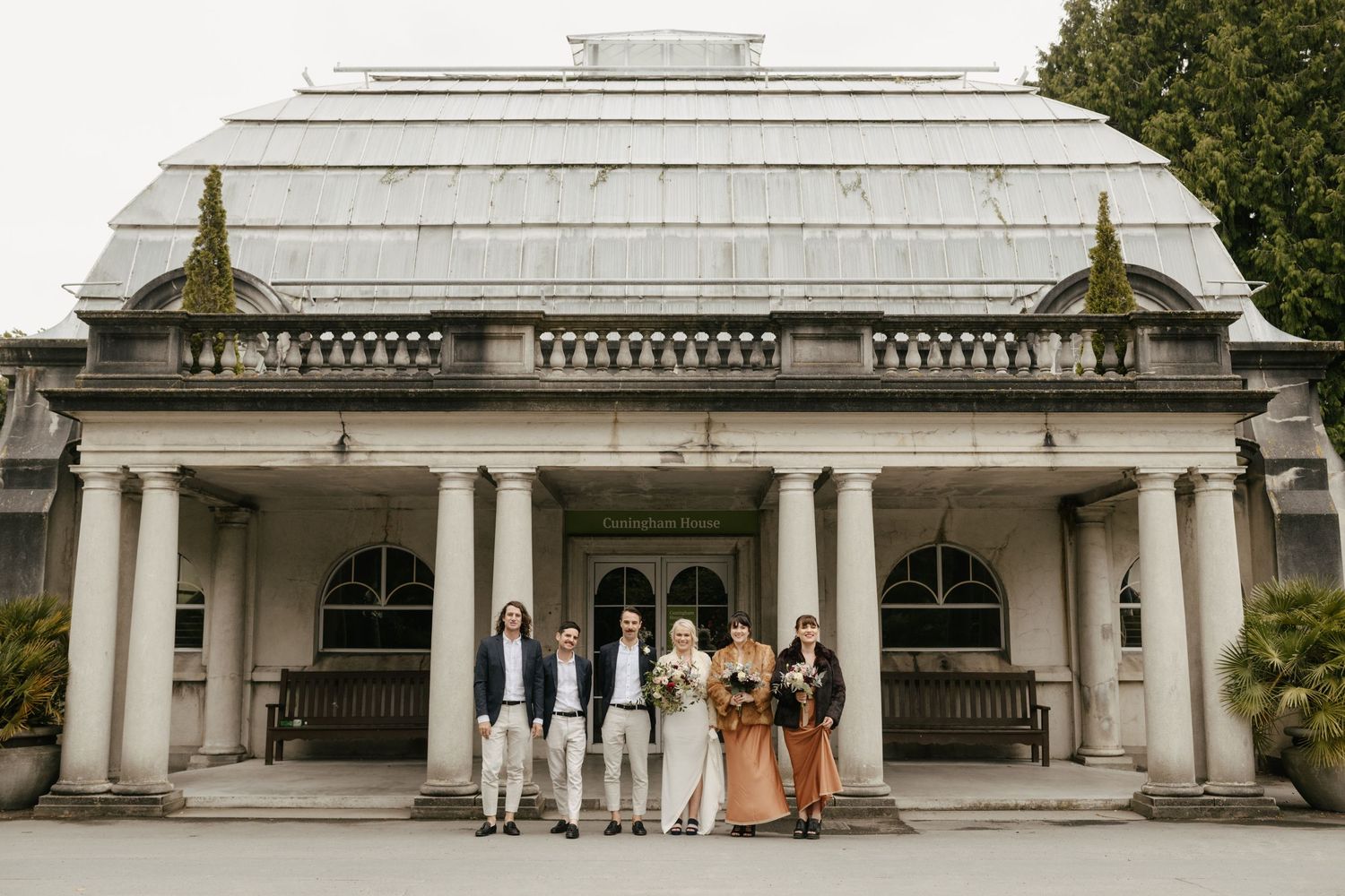 Outside Cunningham House in the Chch Botanical Gardens for a wedding photoshoot.