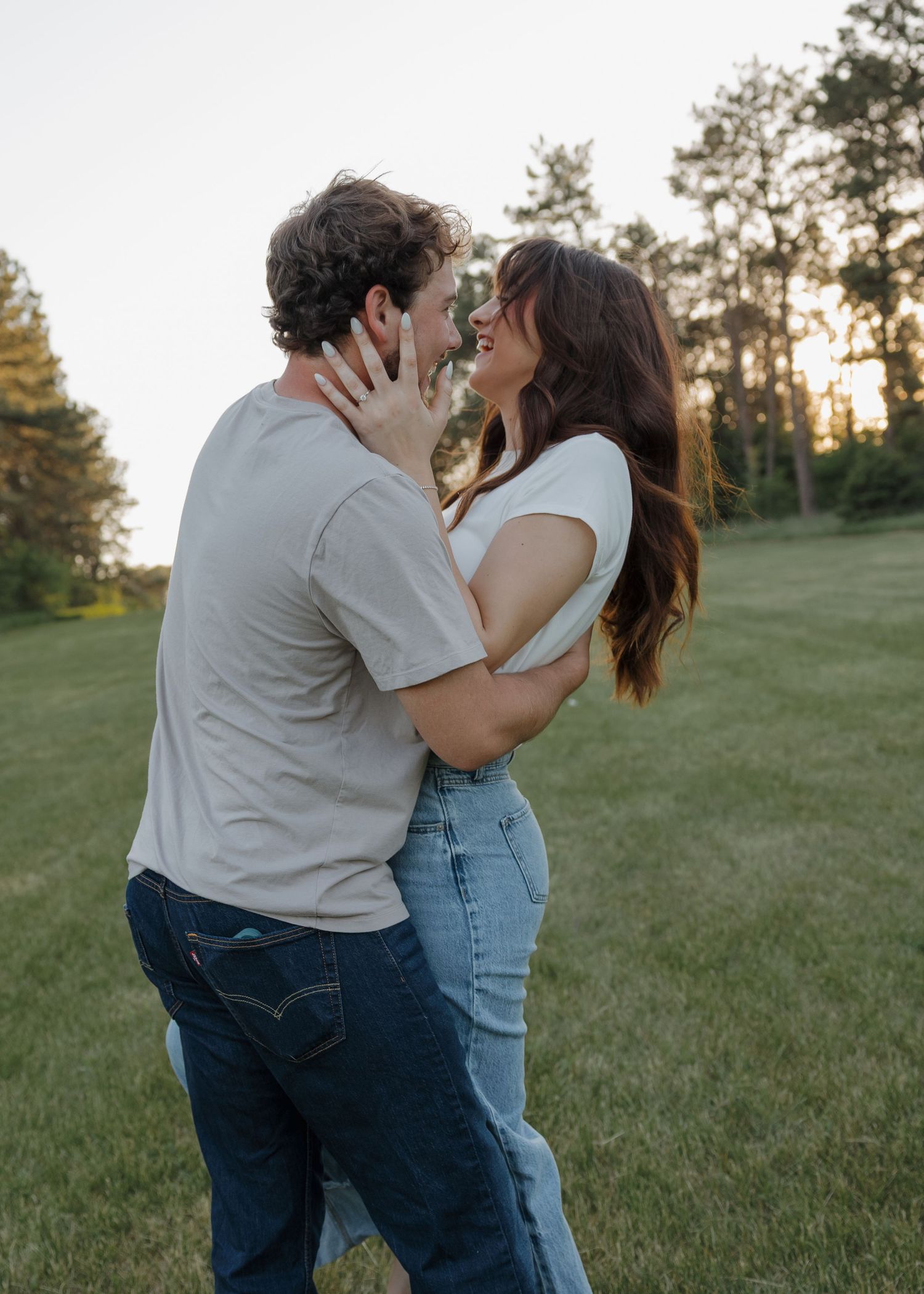 Candid couple laughing together outside