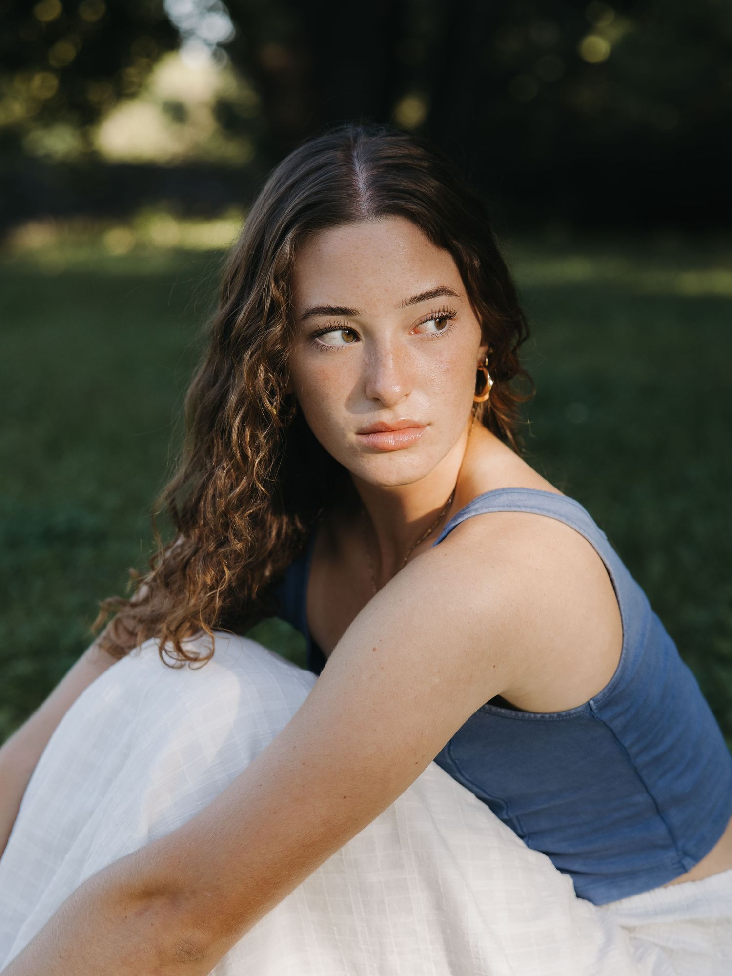 Soft sunset lighting during graduation portraits