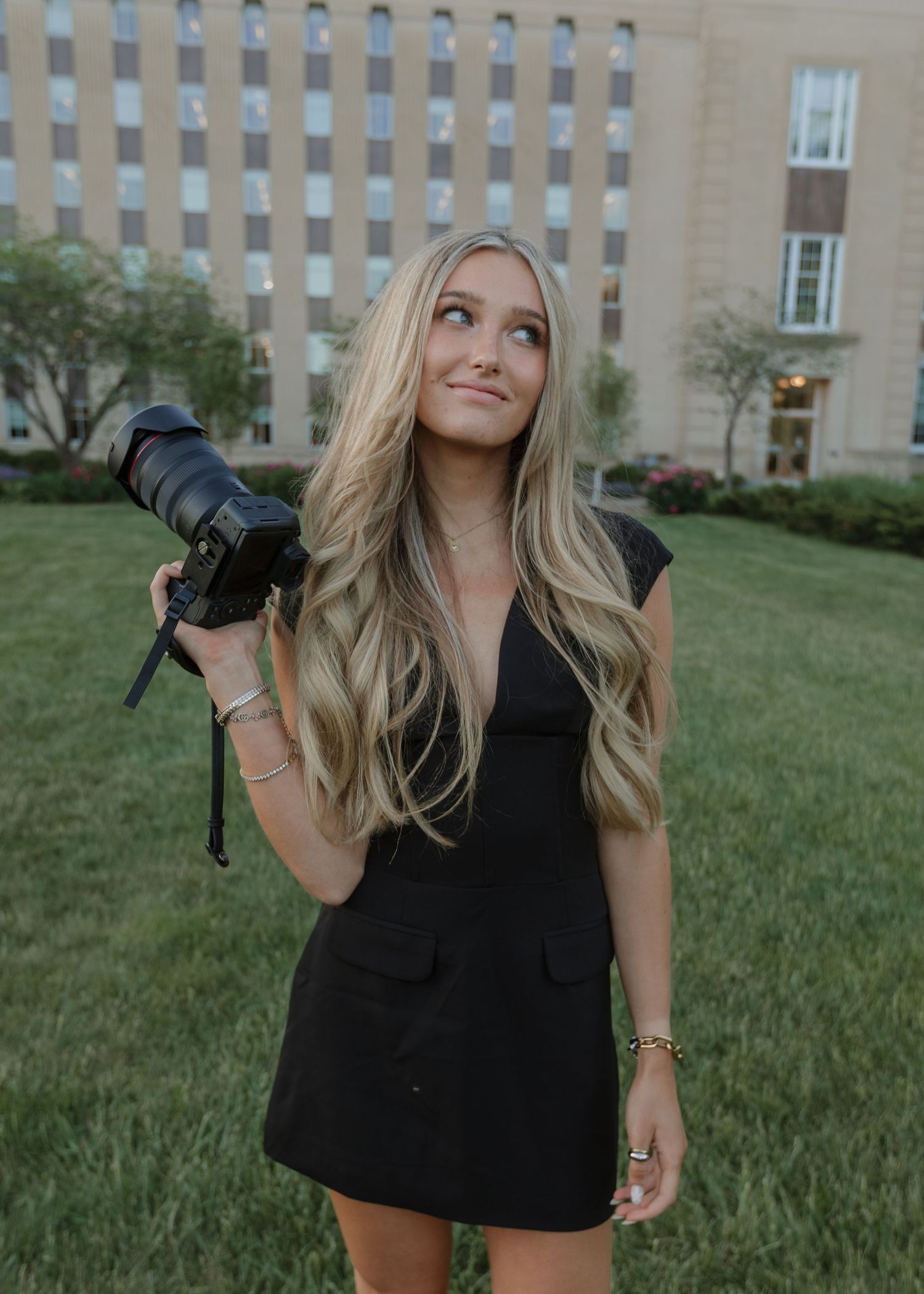 photographer smiling with camera