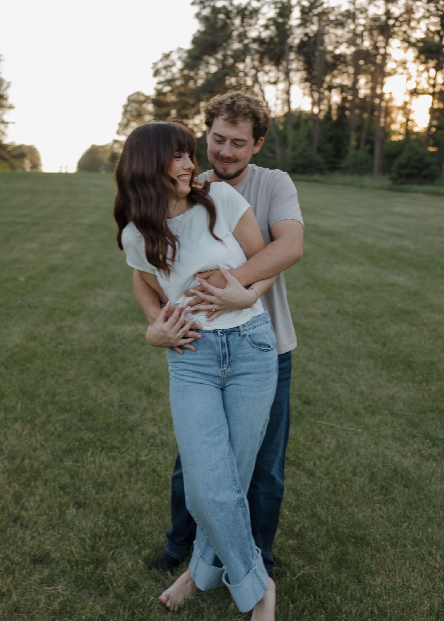 Candid couple laughing together outside