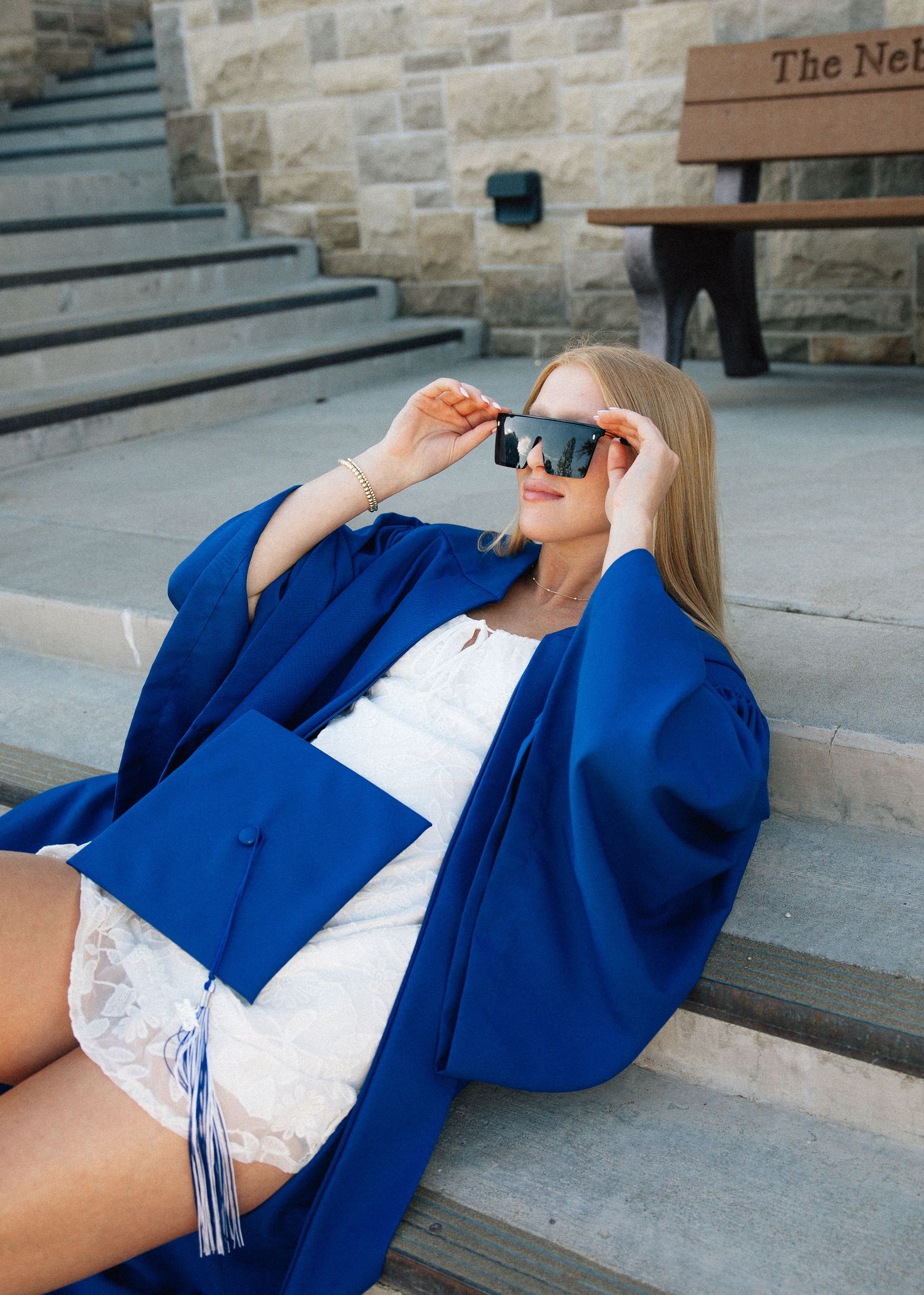 clean and clear cool styled graduation portait session with cap and gown