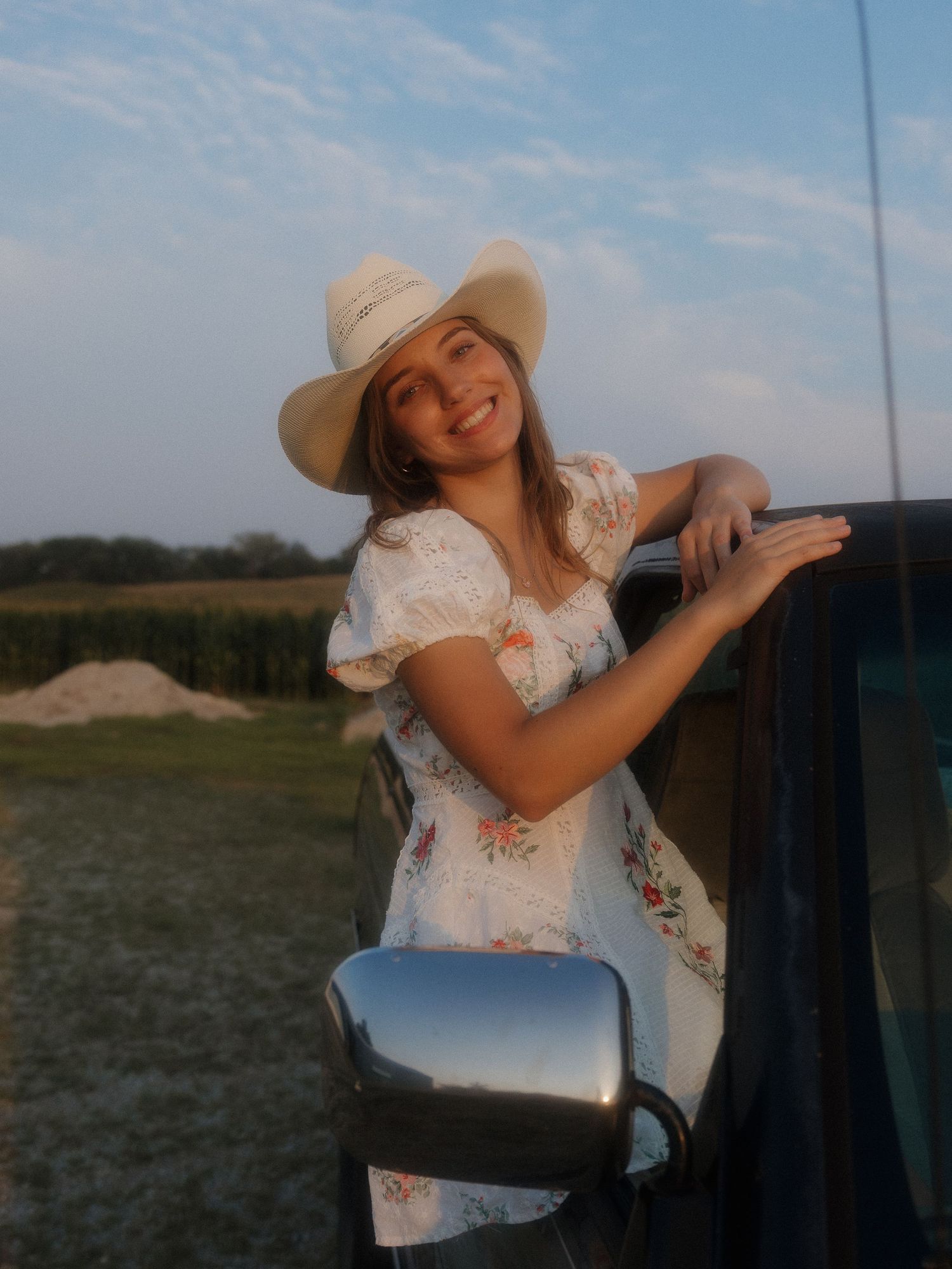 Soft sunset lighting during graduation portraits