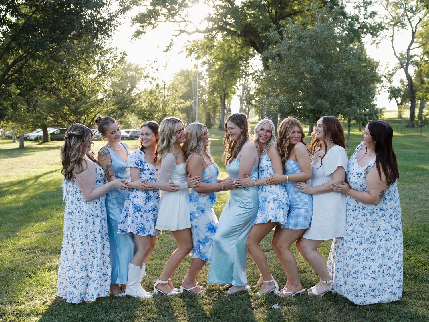 candid bright and colorful sorority group during golden hour