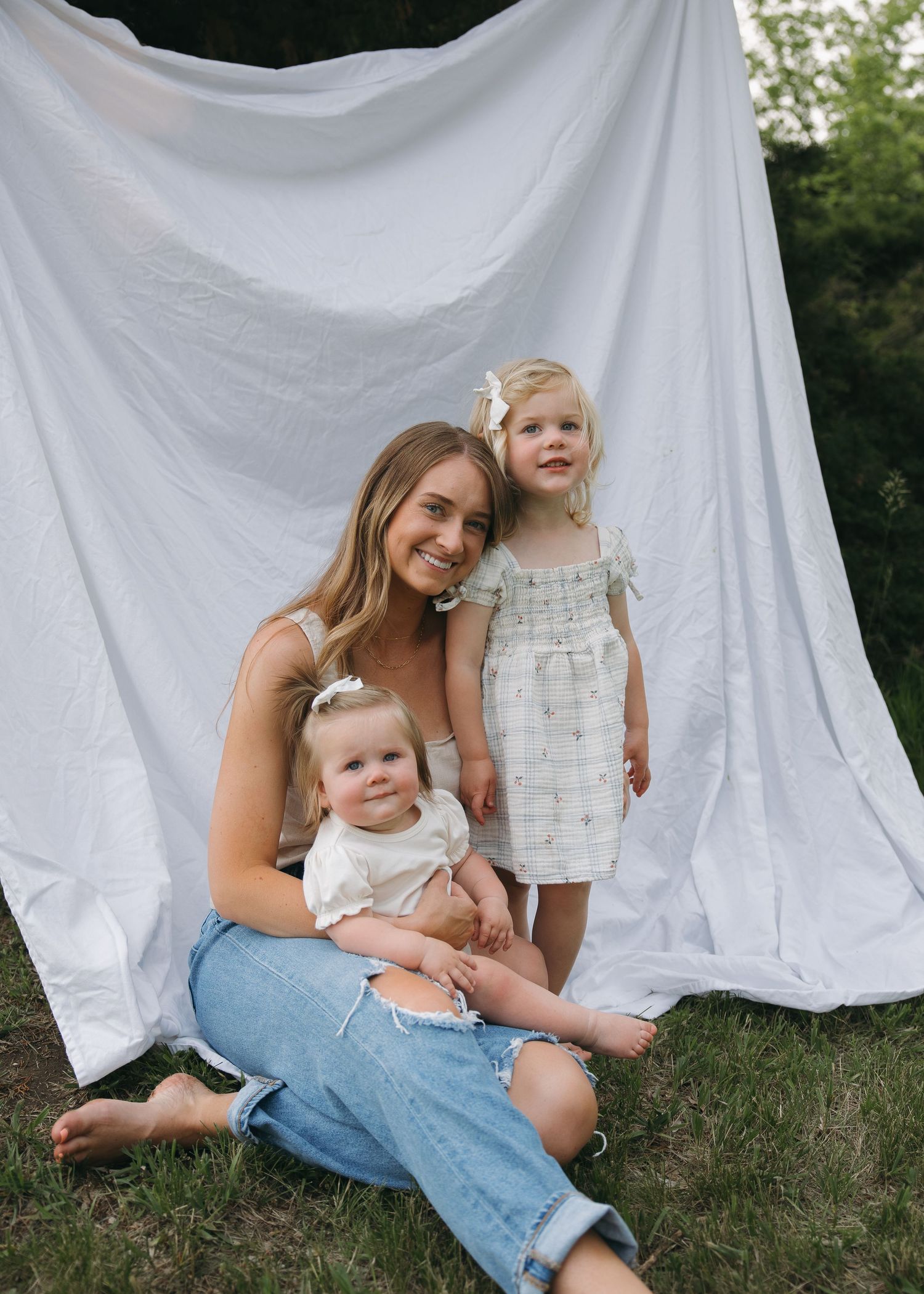 mother and daughters outdoor relaxed family session