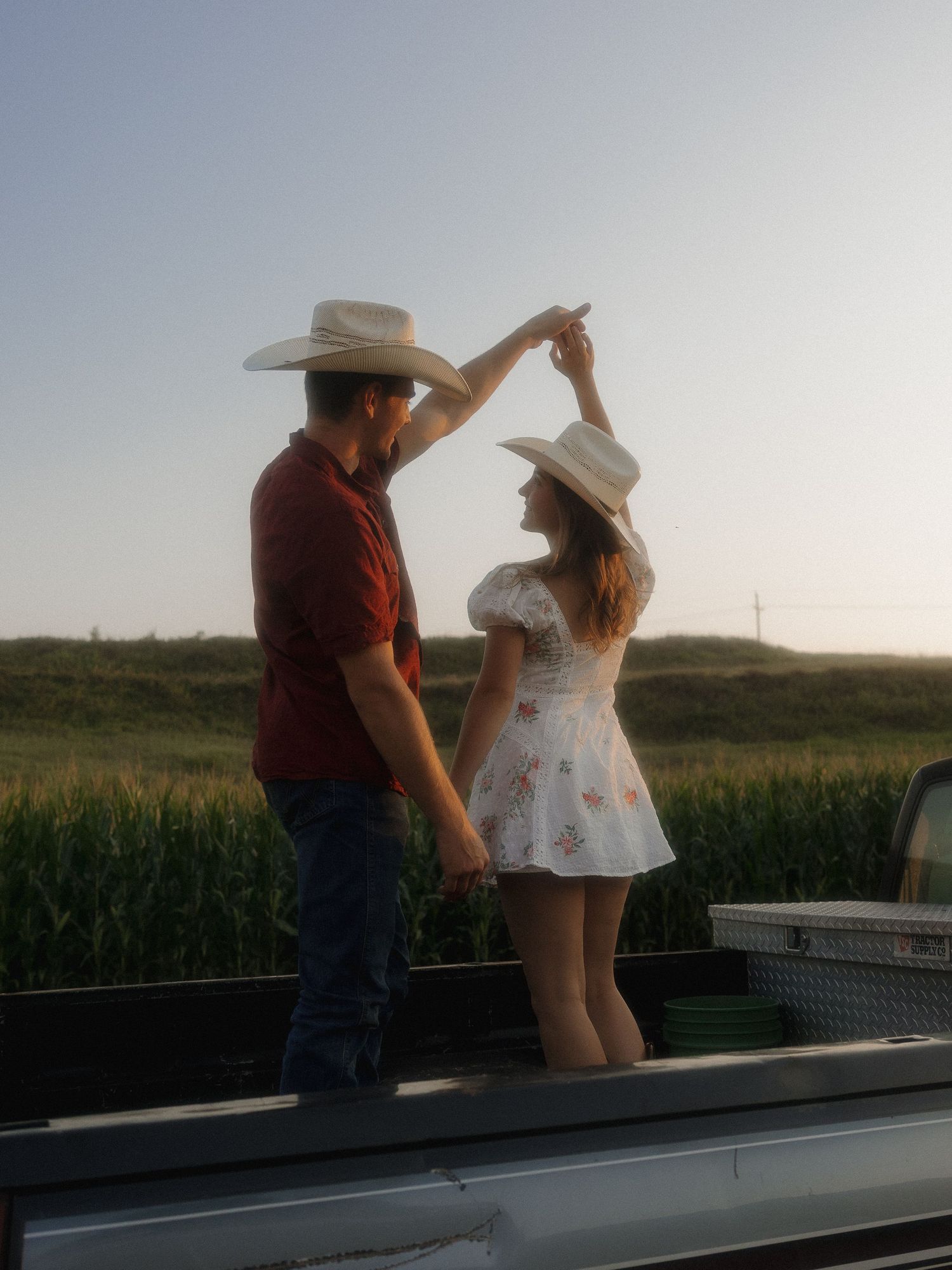 Couple dancing with dreamy golden hour light