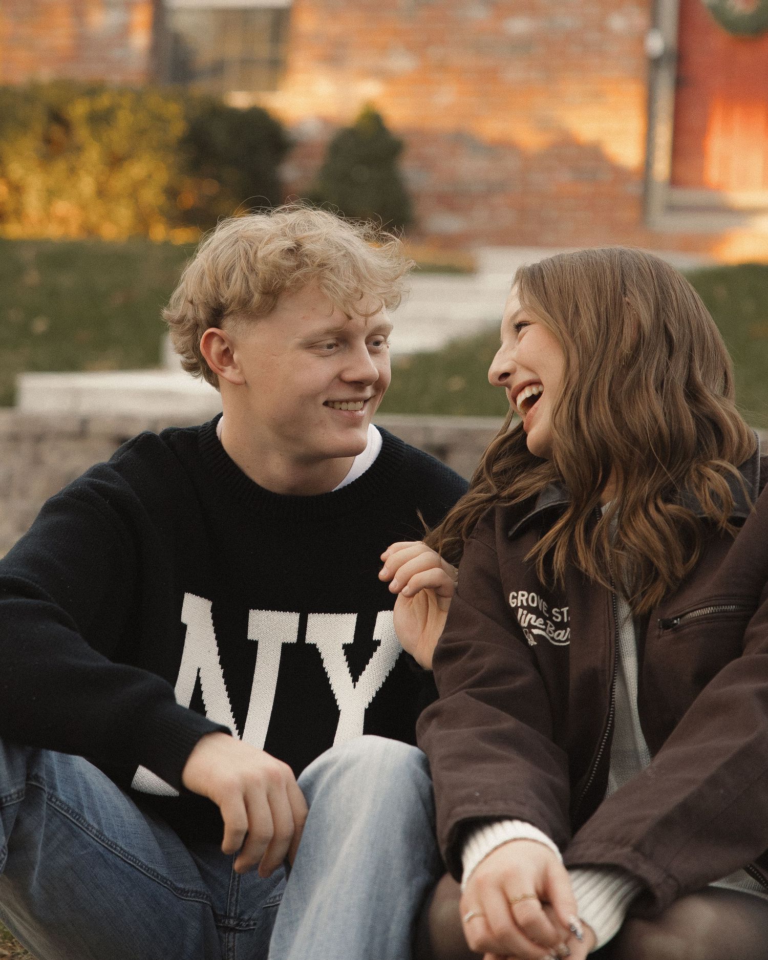 Playful couple portrait capturing laughter and movement