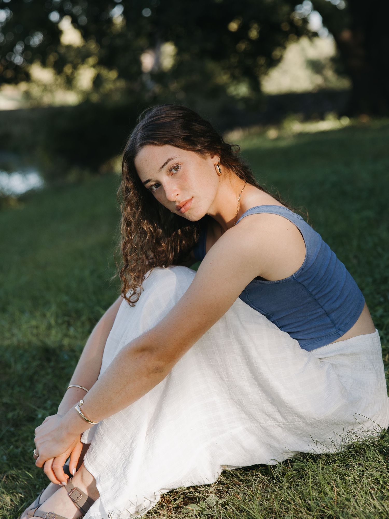 Soft sunset lighting during graduation portraits