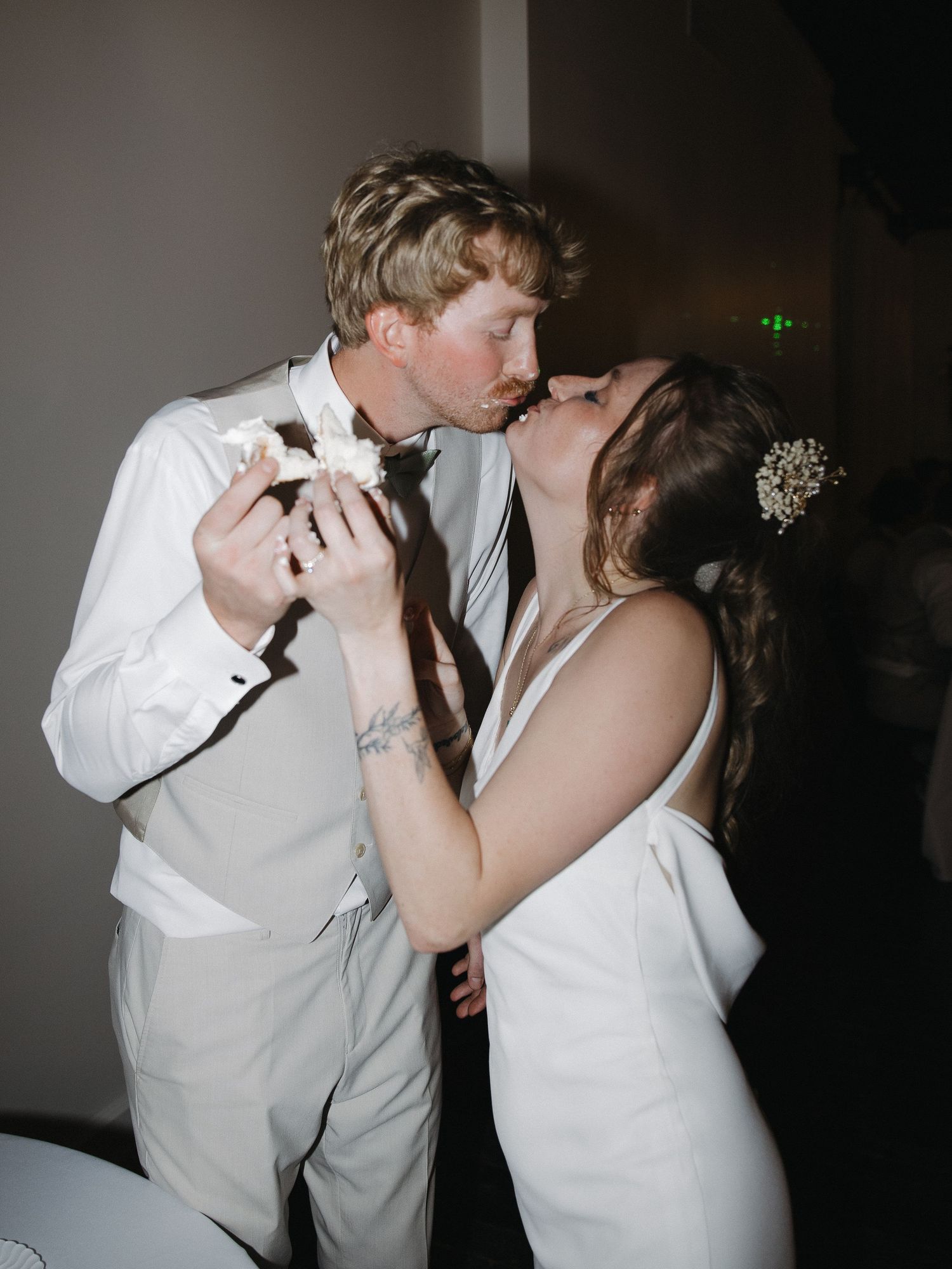 Candid wedding moment of couple laughing