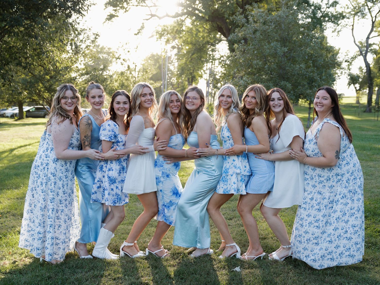 candid bright and colorful sorority group during golden hour