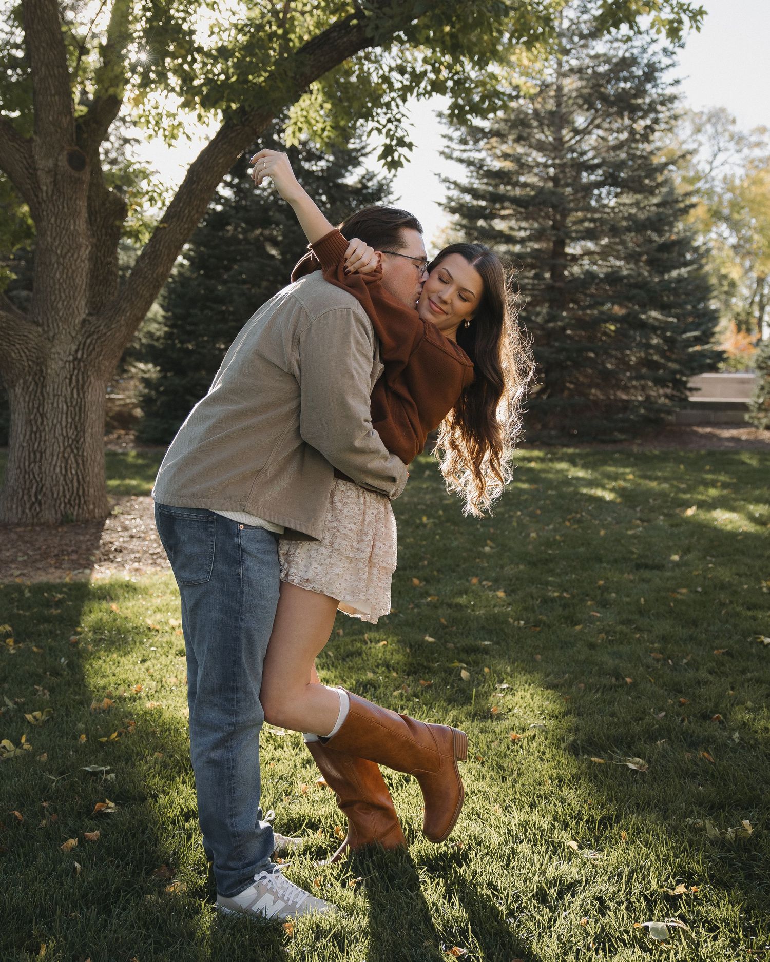 Couple embracing during portrait session outdoors