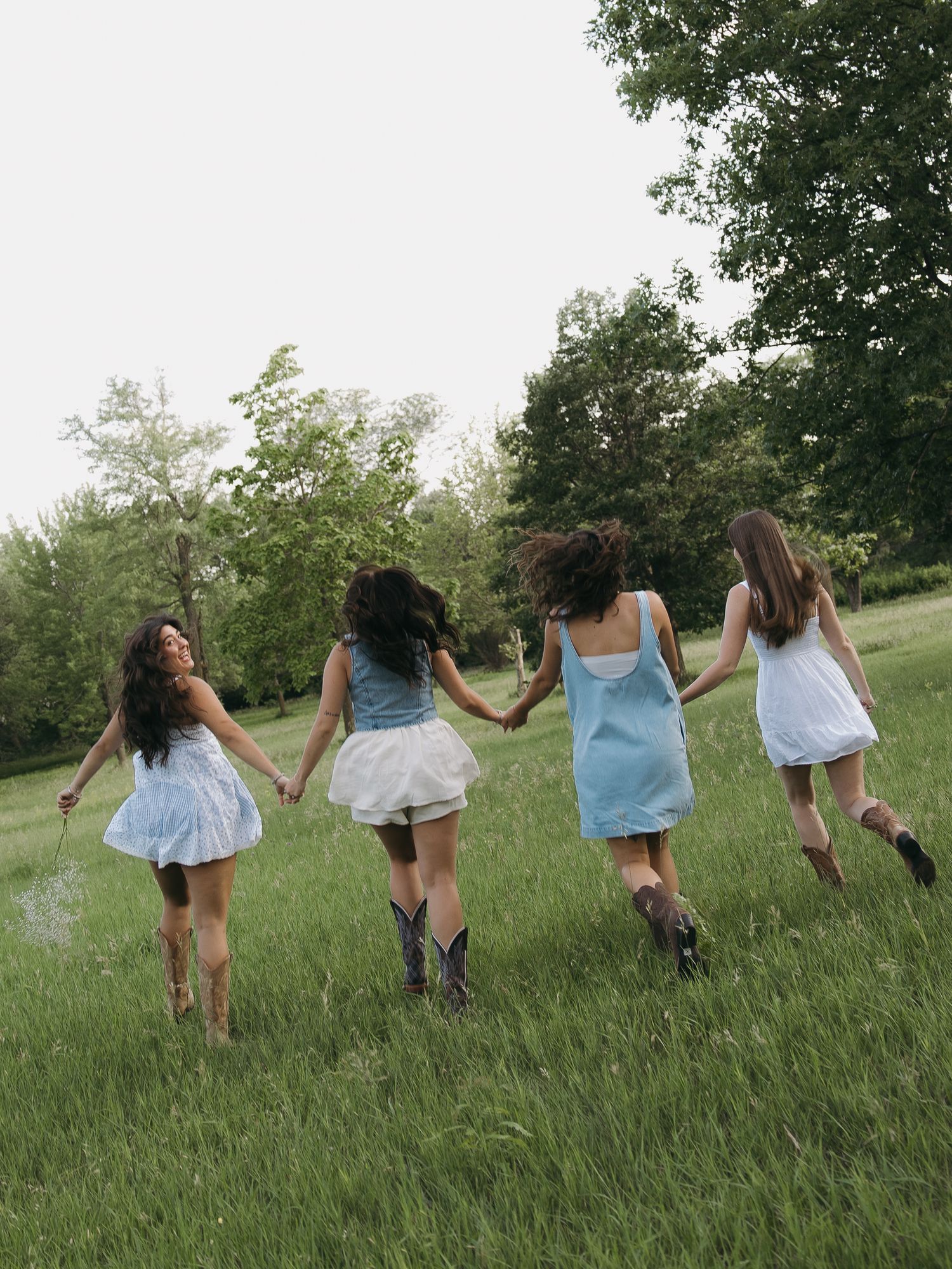 Candid group movement in friends outdoor portrait session