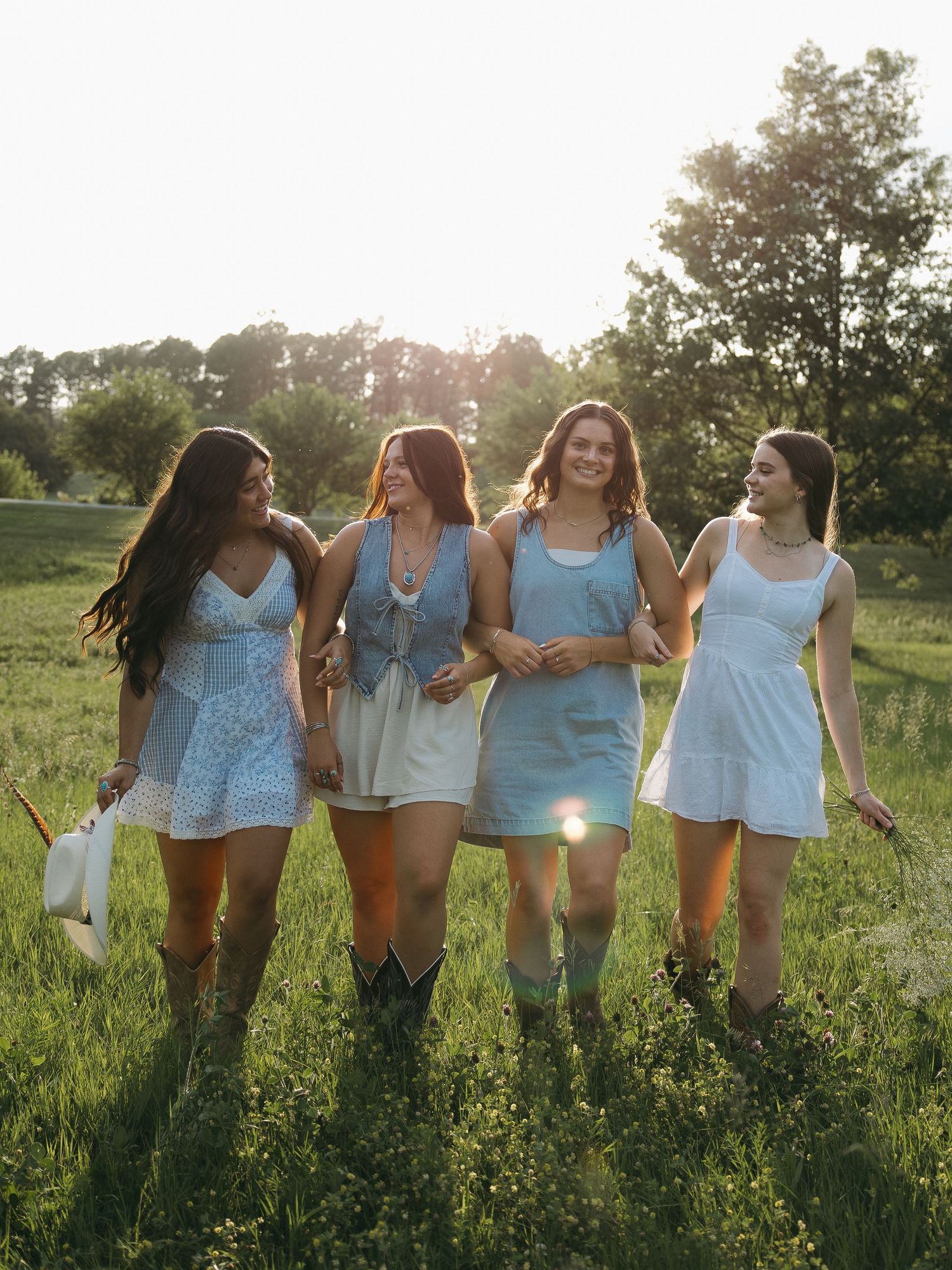 Friend graduation session in golden hour lighting outside