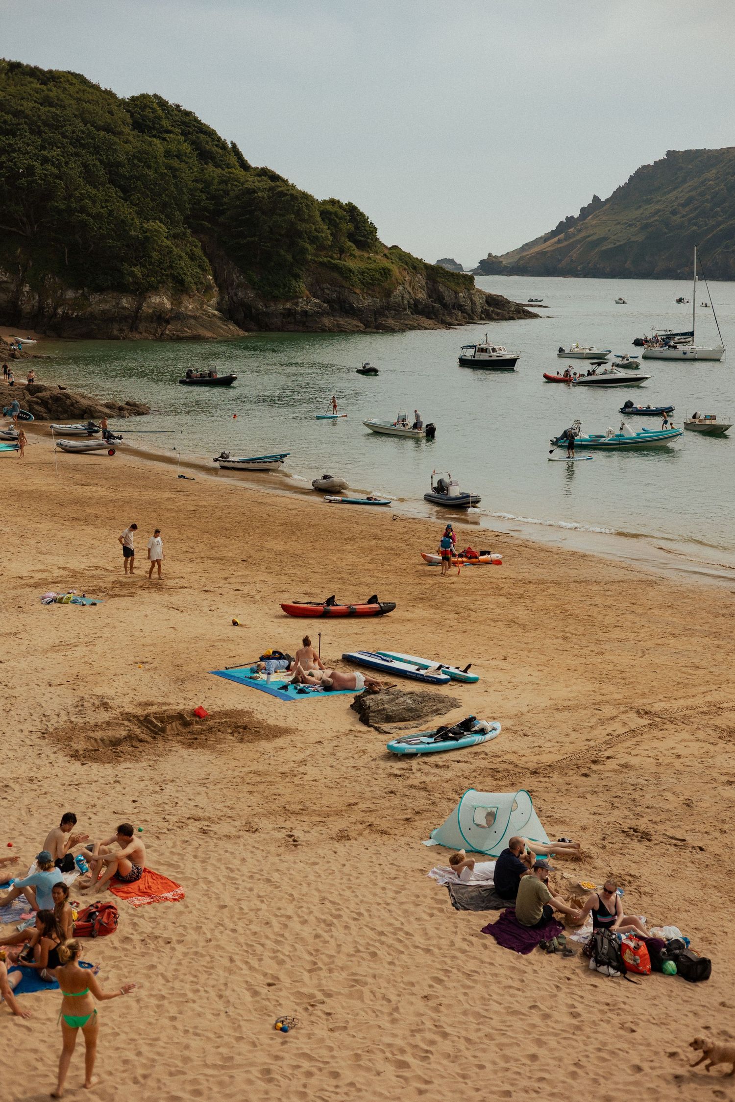 families playing by the sea during a beach photoshoot in Salcombe in the South Hams, South Devon