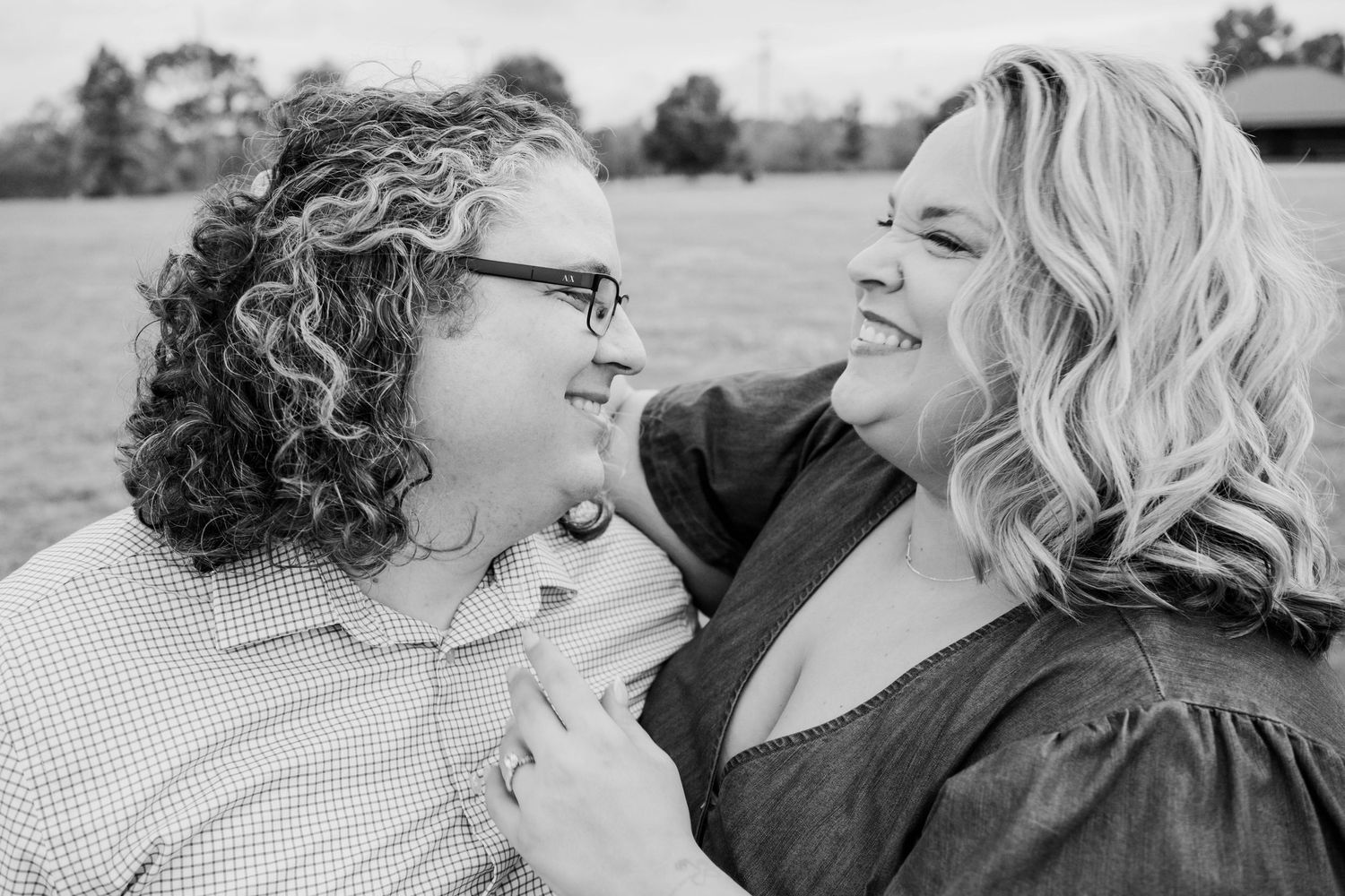 Romantic couple’s portrait at Highland Park in Baton Rouge—natural light, lush greenery, and authentic moments captured with timeless style.