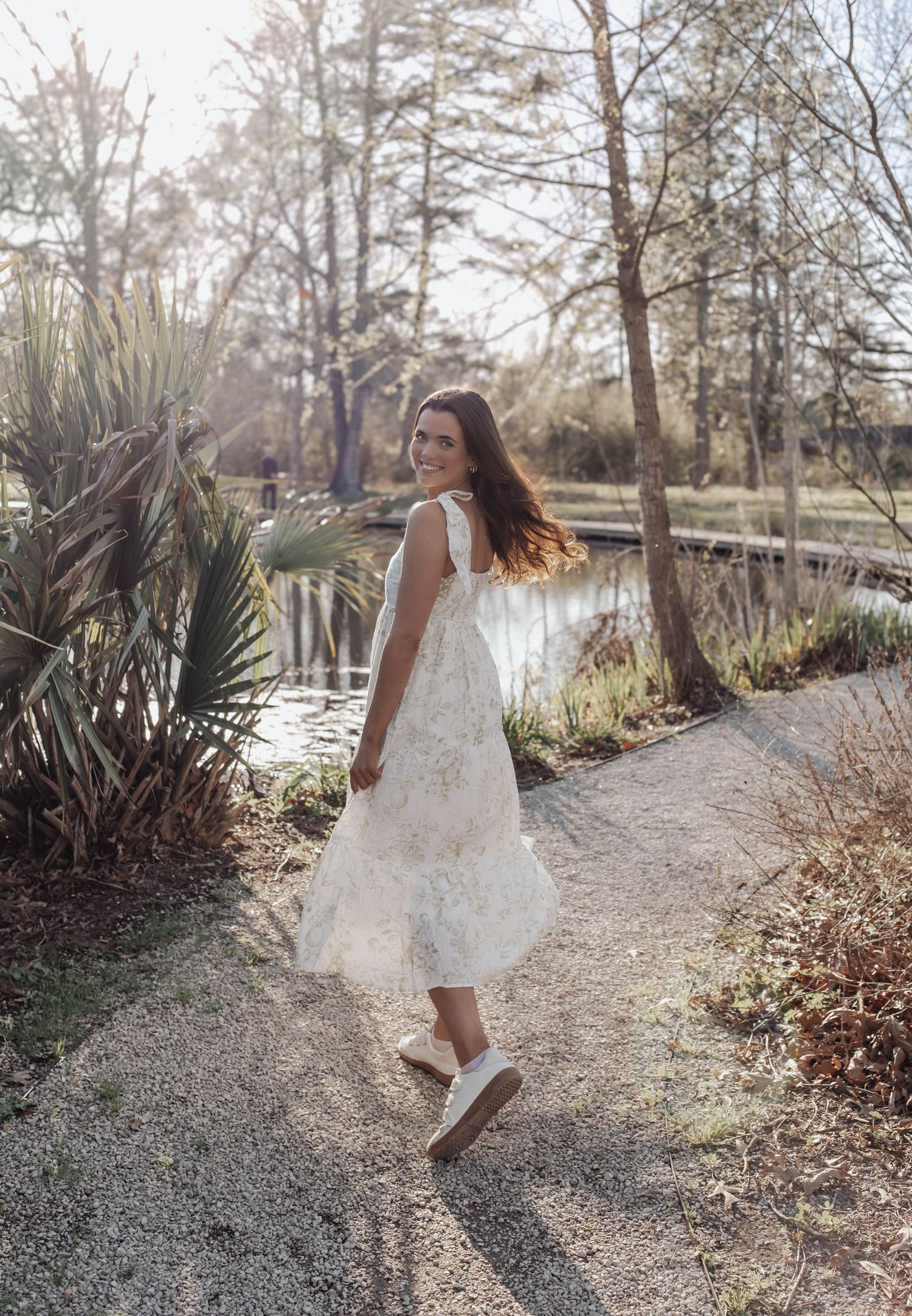 Senior portraits at LSU Hilltop Arboretum with natural light, greenery, and timeless style—capturing authentic moments in a serene setting.