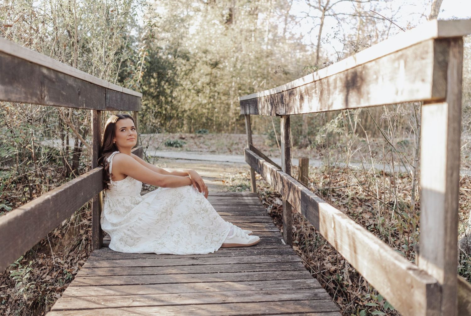 Senior portraits at LSU Hilltop Arboretum with natural light, greenery, and timeless style—capturing authentic moments in a serene setting.