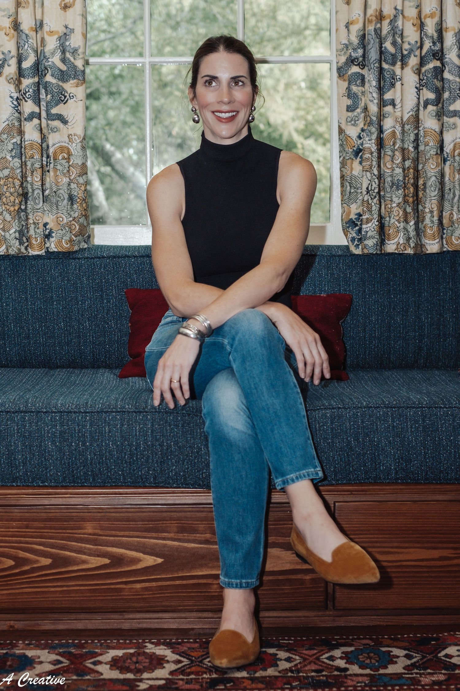 Branding portrait of a wallpaper artist at home, smiling — authentic, creative, professional imagery showcasing her craft & personality.