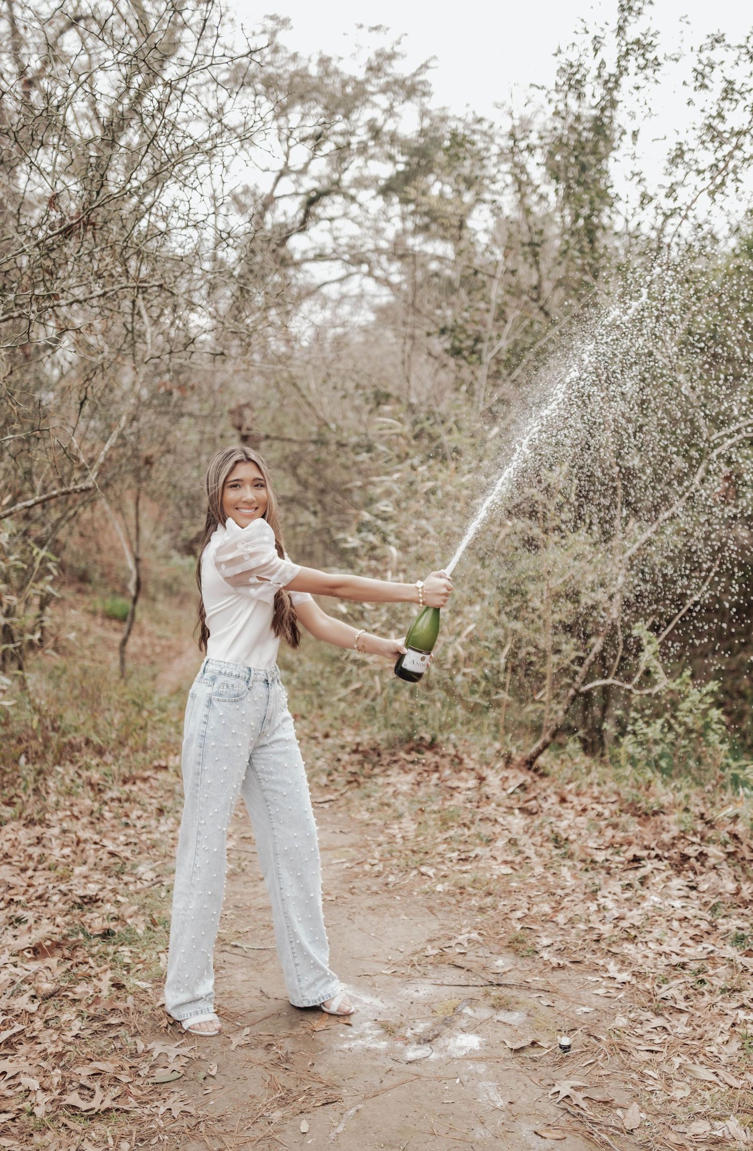 Senior portraits at LSU Hilltop Arboretum with natural light, greenery, and timeless style—capturing authentic moments in a serene setting.