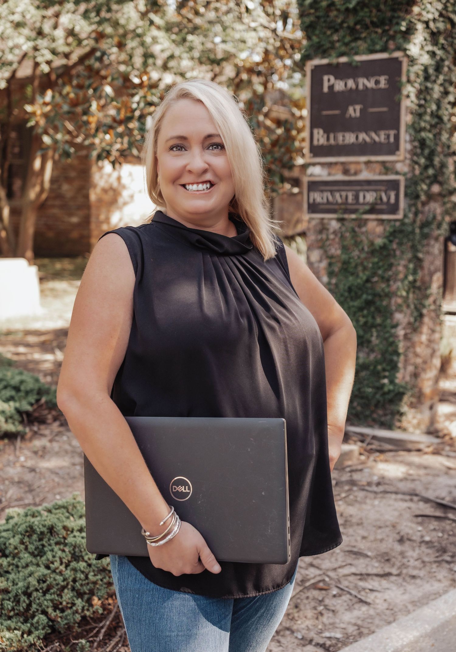 Professional branding portrait of a Baton Rouge property manager outside her office — confident, approachable, and authentic imagery.