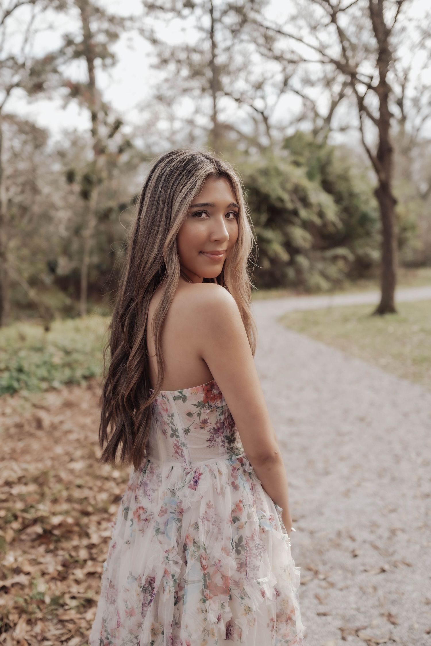 Senior portraits at LSU Hilltop Arboretum with natural light, greenery, and timeless style—capturing authentic moments in a serene setting.