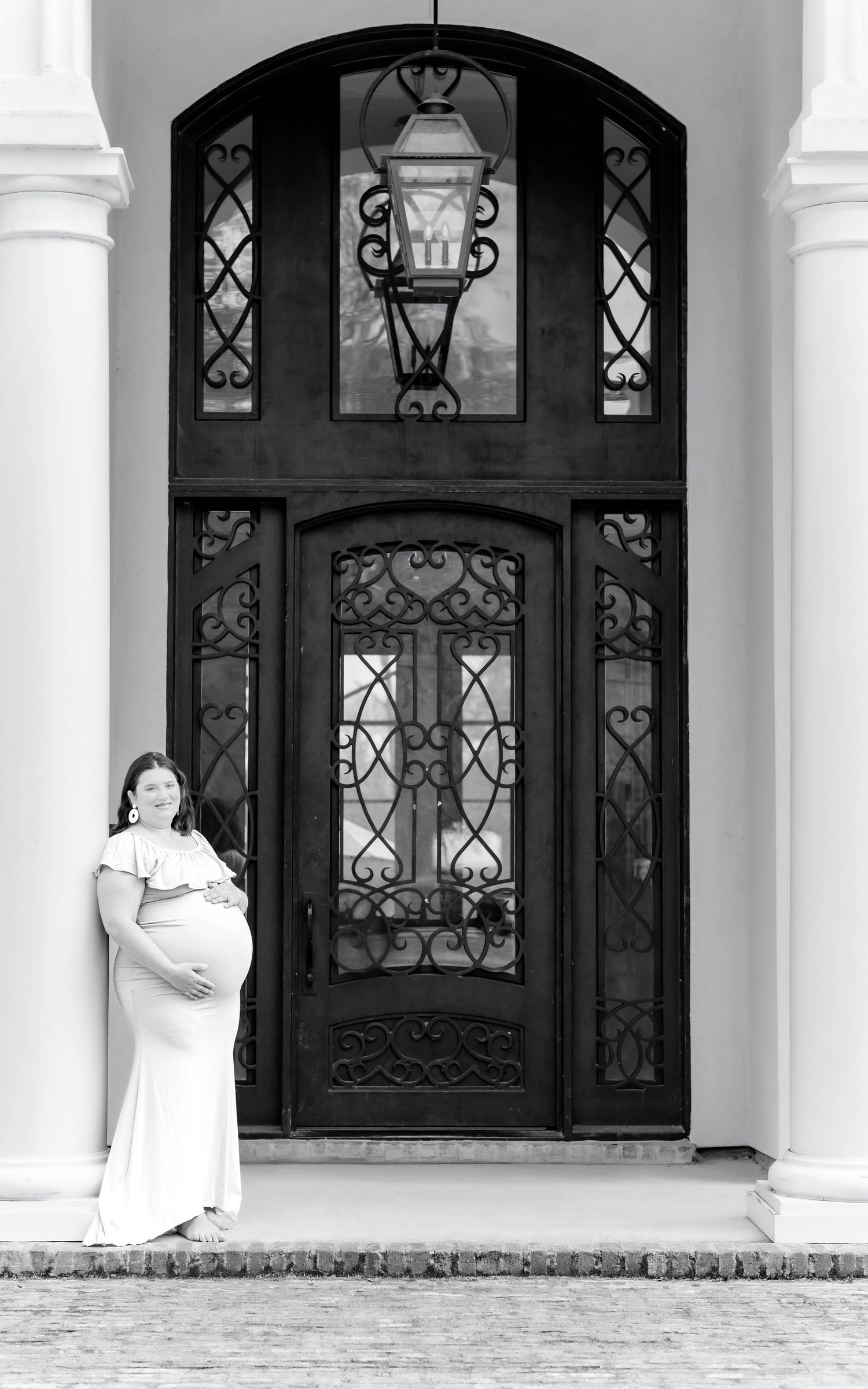 Maternity session in Baton Rouge featuring natural light, soft neutrals, and timeless styling