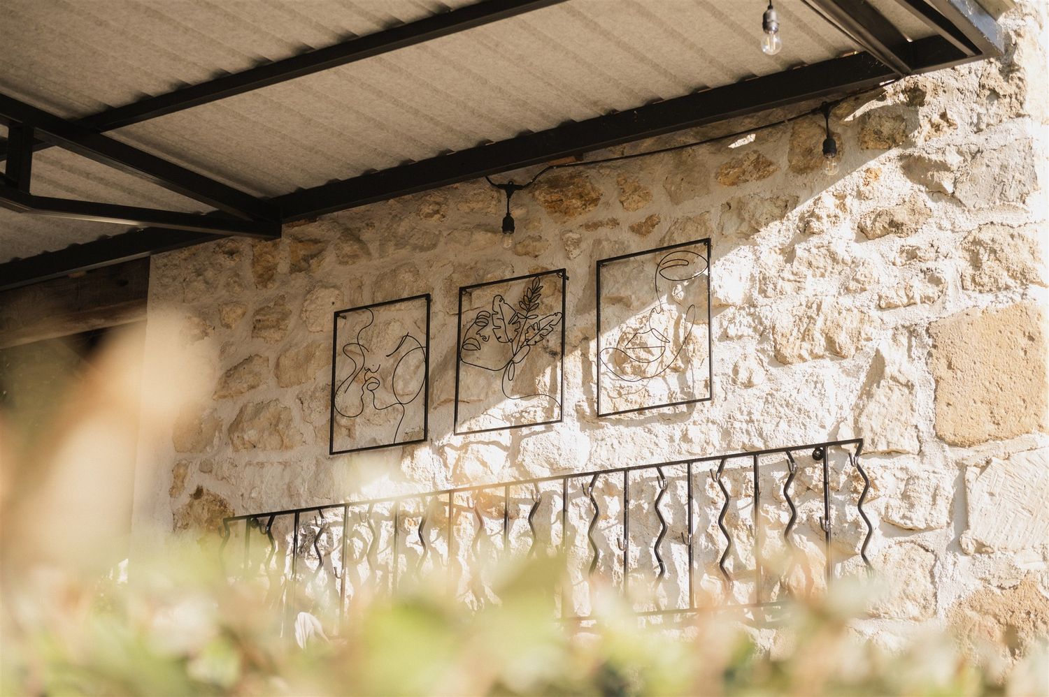 Stone wall architectural detail with rustic textures and shadows.