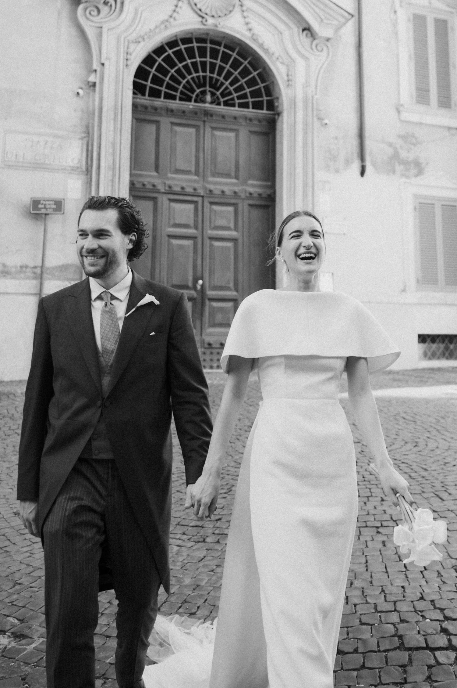 Black and white photo sequence of newlyweds walking together on historic street.