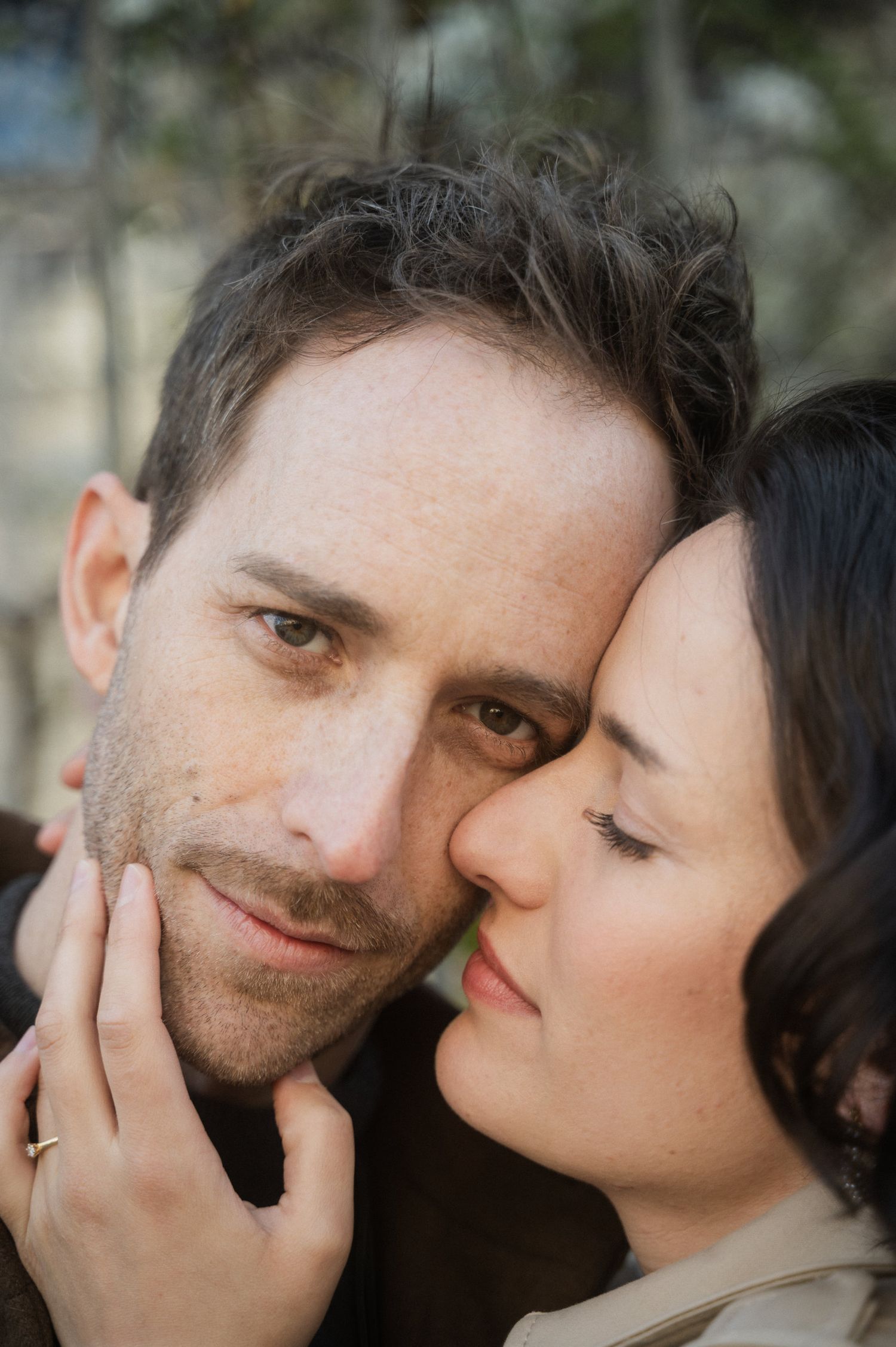 A romantic sequence of close-up shots showing an intimate couple sharing tender moments and kisses.