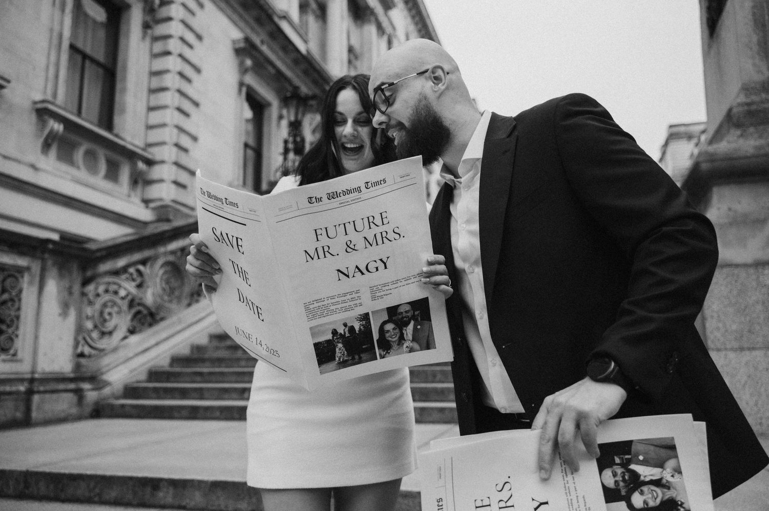 A couple holds newspapers with text in a black and white photo series.