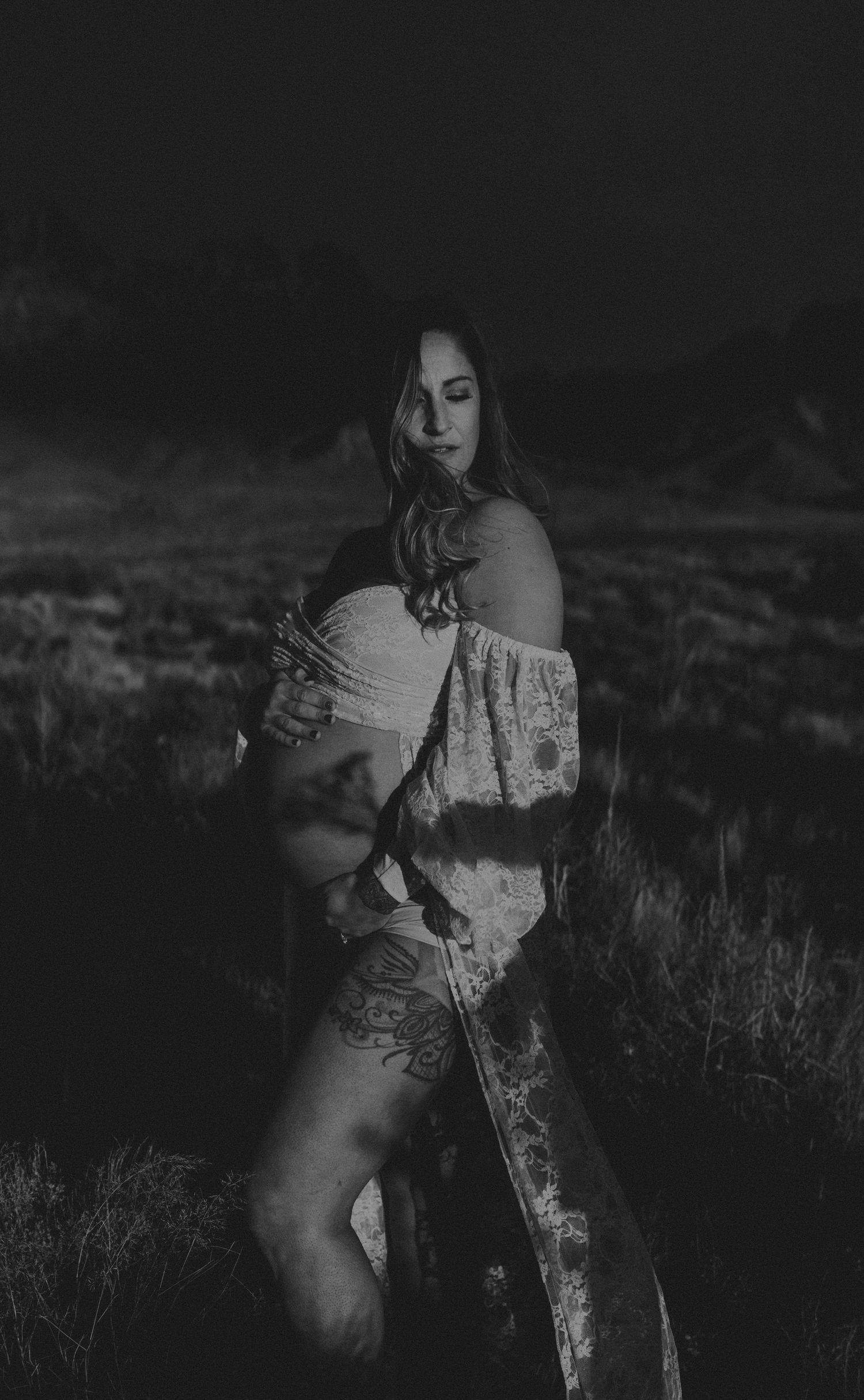 Pregnancy photography session at sunset in Fate TX, flowing dress and the perfect tones.