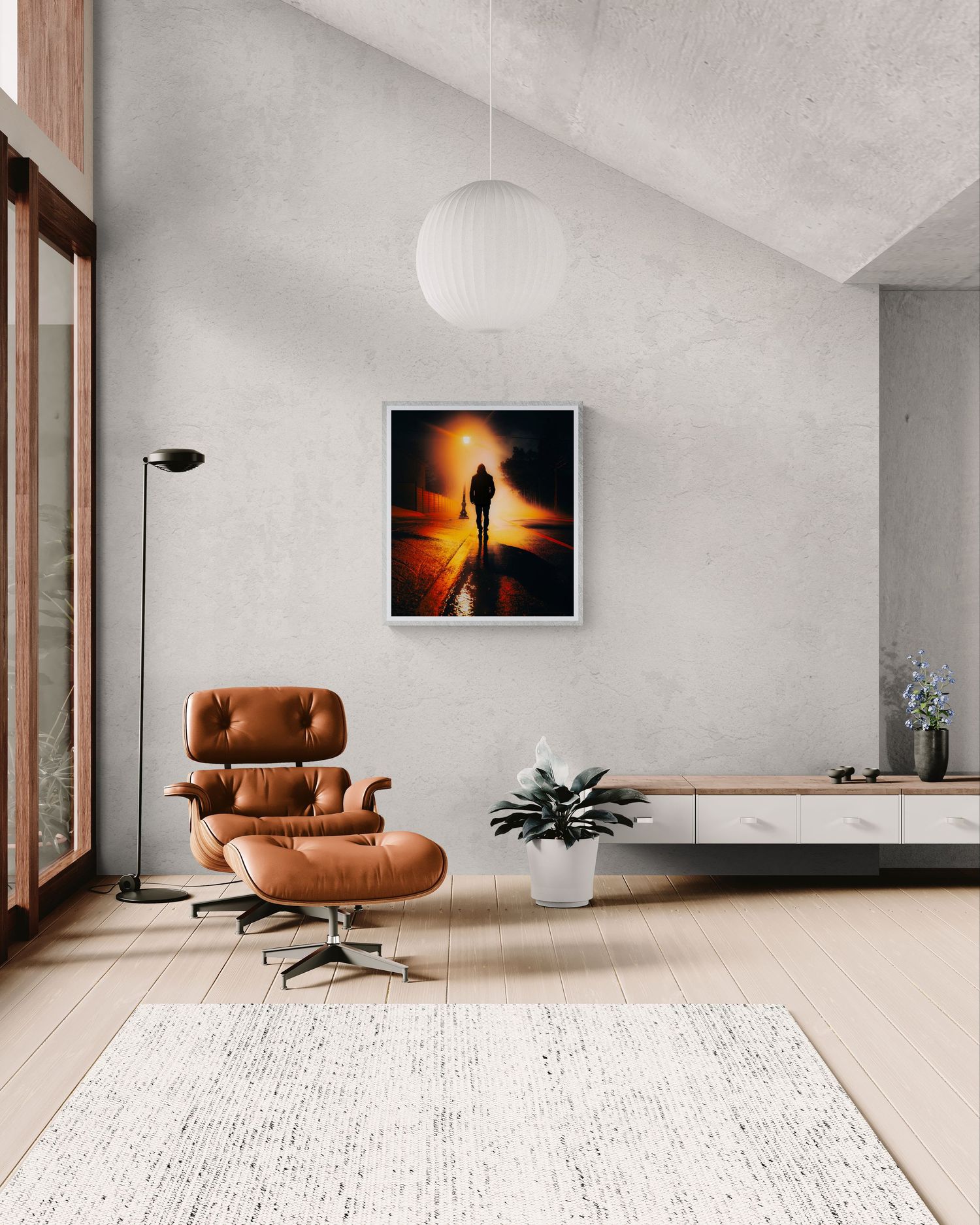 Modern living room with Eames lounge chair, featuring dramatic sunset artwork on wall above minimalist credenza.