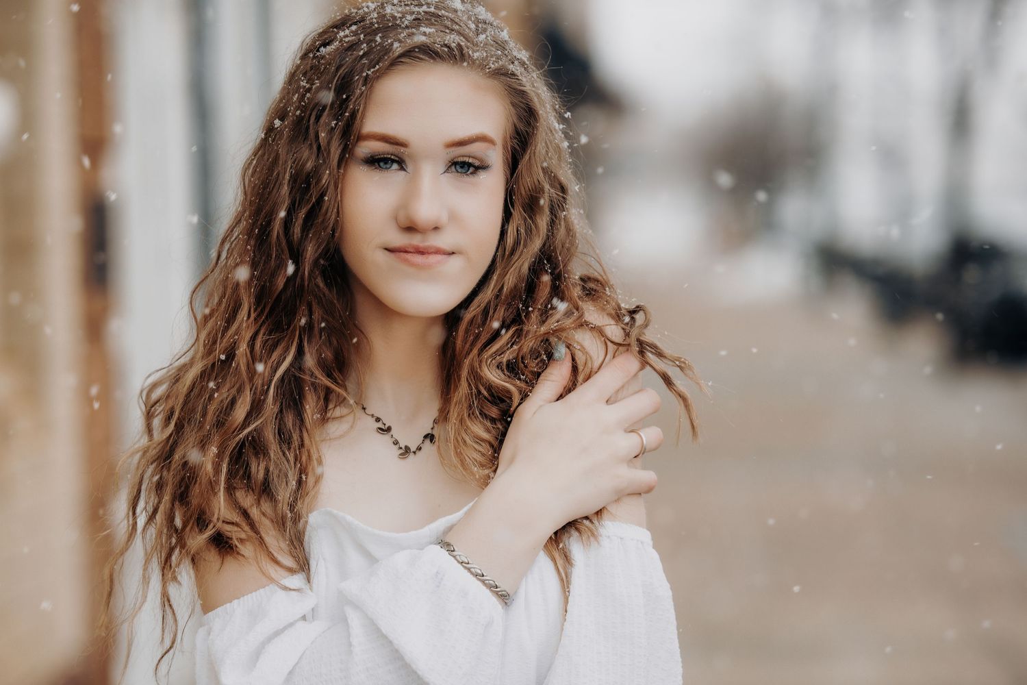 Winter Senior Pictures by Minneapolis senior photographer capturing outdoor senior portraits