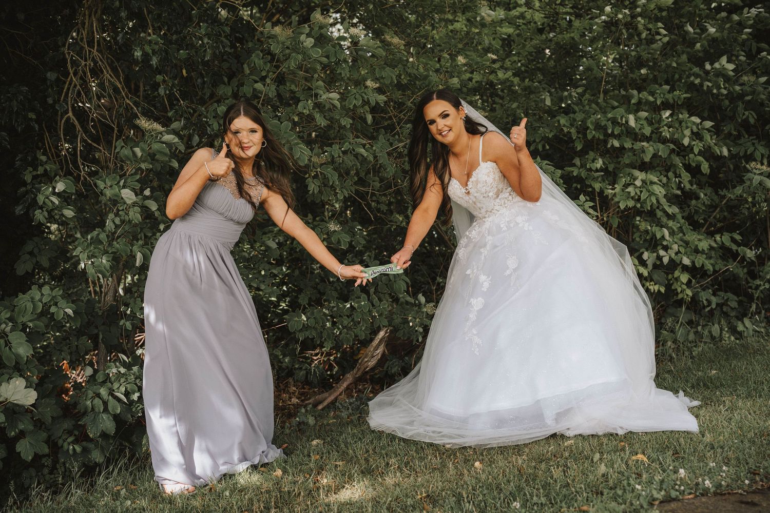 A collection of romantic wedding photos showing a couple in white formal attire posing together in a garden setting.