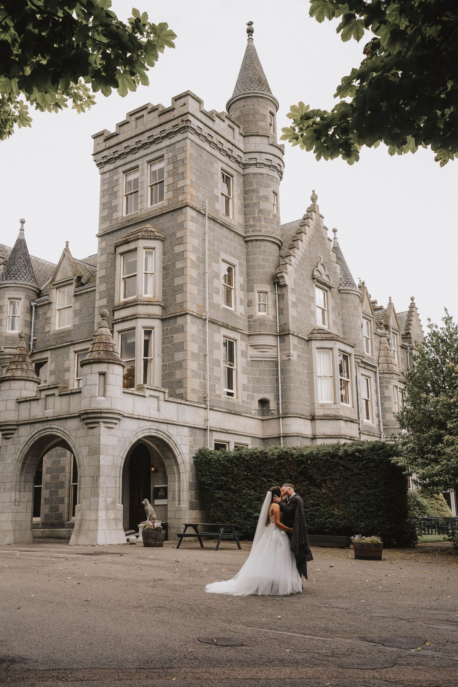 Gothic castle wedding venue with stone architecture and towers creating a romantic backdrop for special occasions.