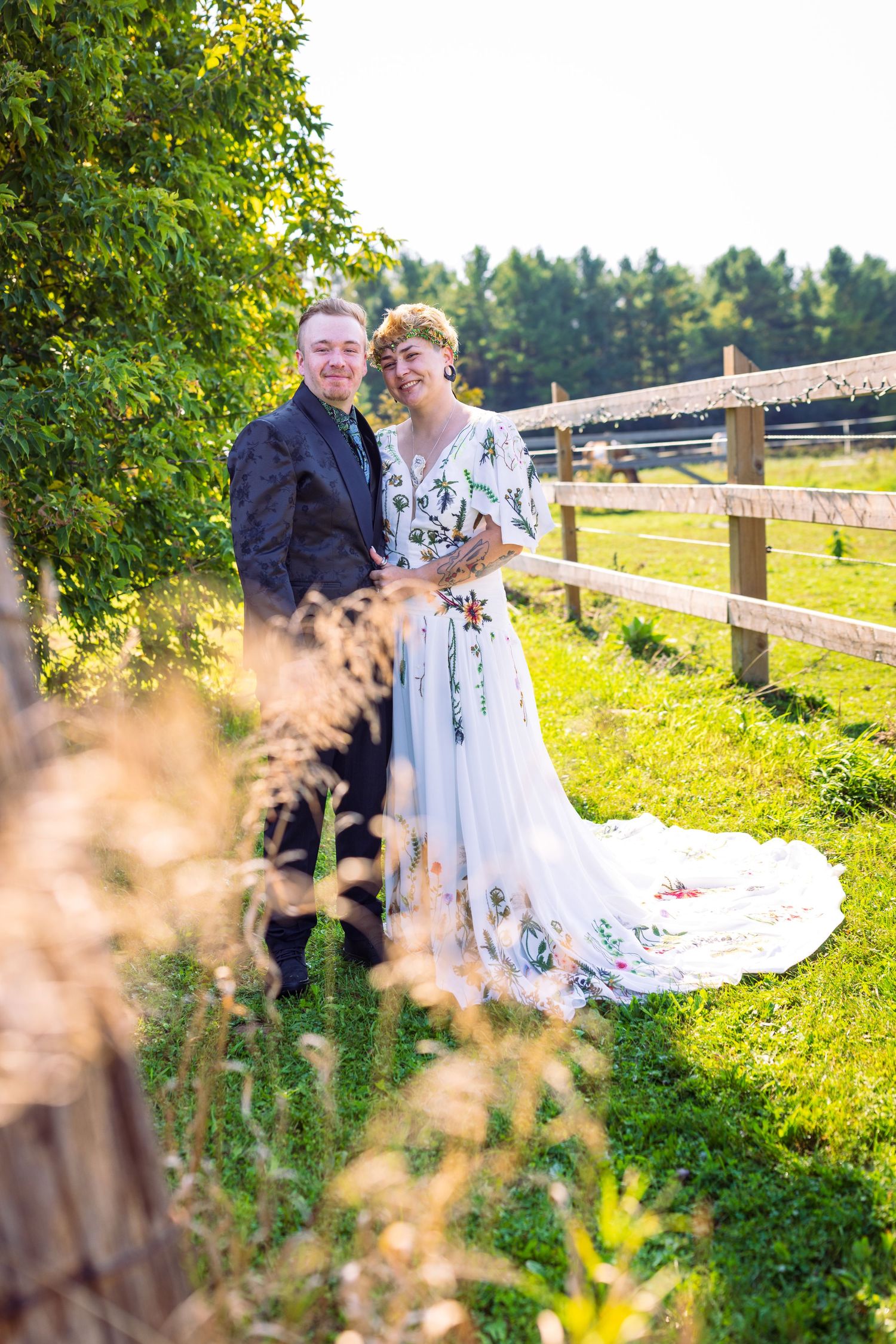 The lovely bride & Groom enjoying the warm summer weather of their home style wedding | Tim Gowling Photography
