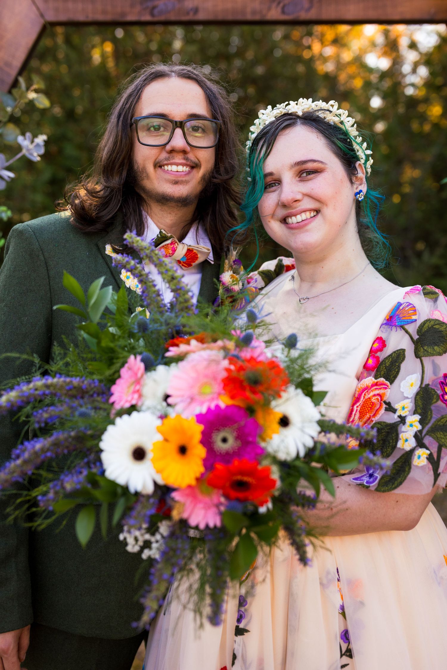 The new bride holding her beautiful bouquet & groom so happy after the wedding ceremony at chateau mille fleurs | Tim Gowling Photography