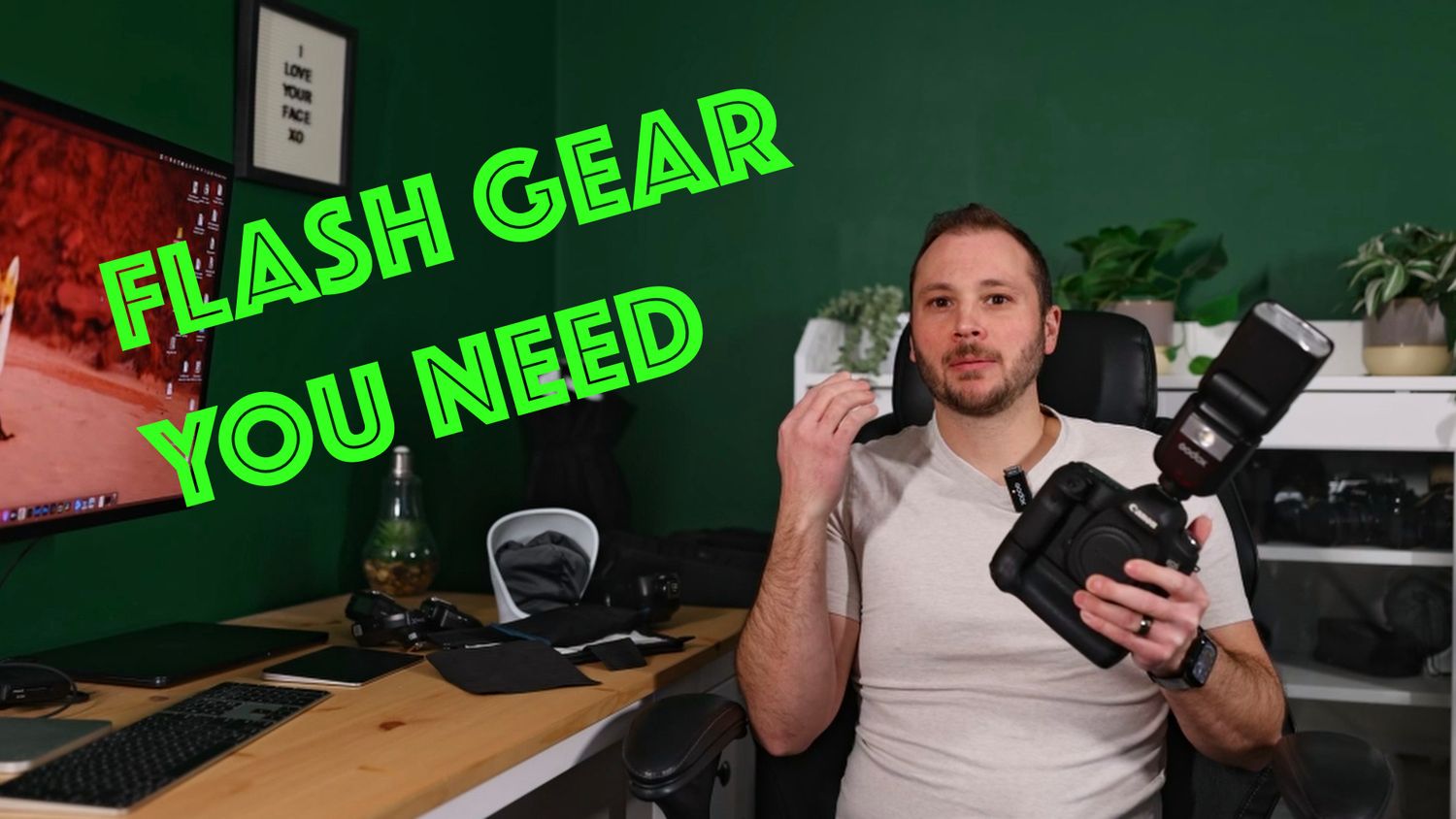 Green neon text overlays a series of dark video frames showing computer equipment and tech gear.