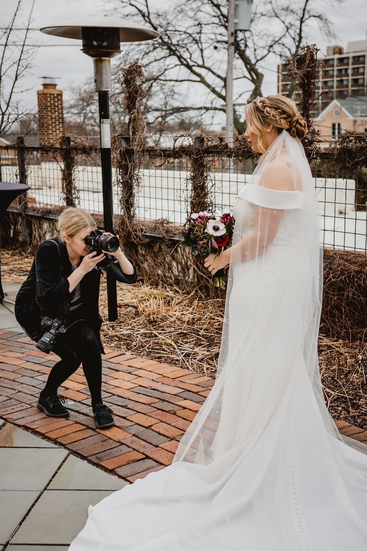 Sara photographing a bride
