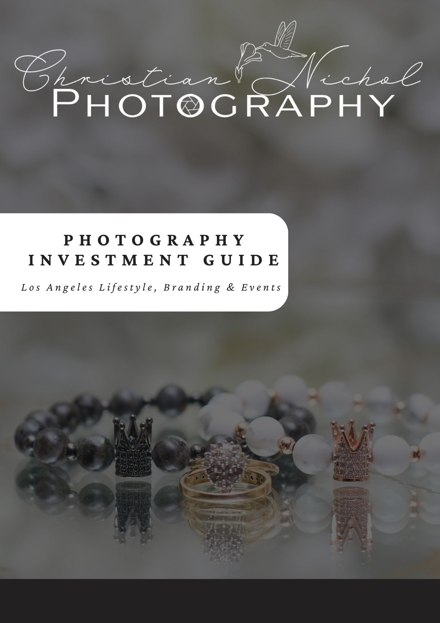 Photography investment guide cover design with elegant script logo and jewelry rings on blurred background.