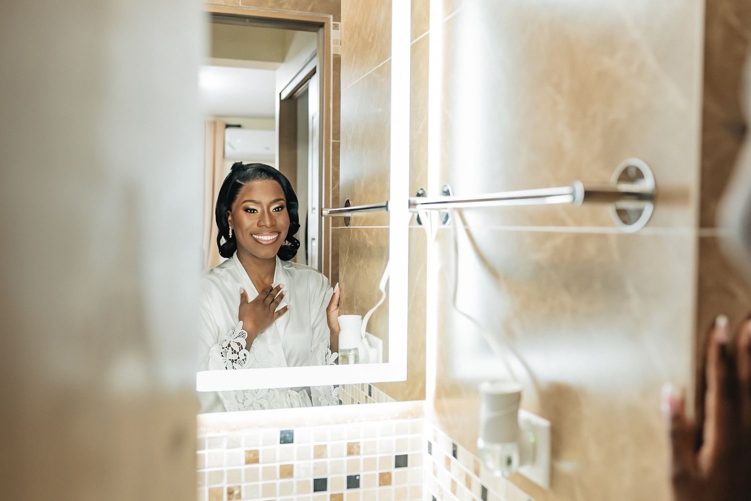 Candid wedding preparation moments captured in a warm-toned interior setting.