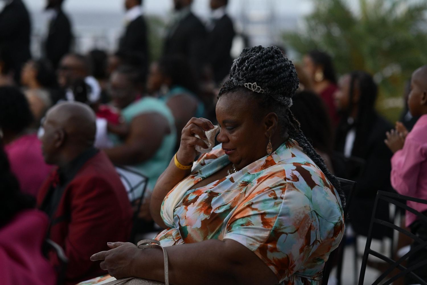 Lady crying at a wedding